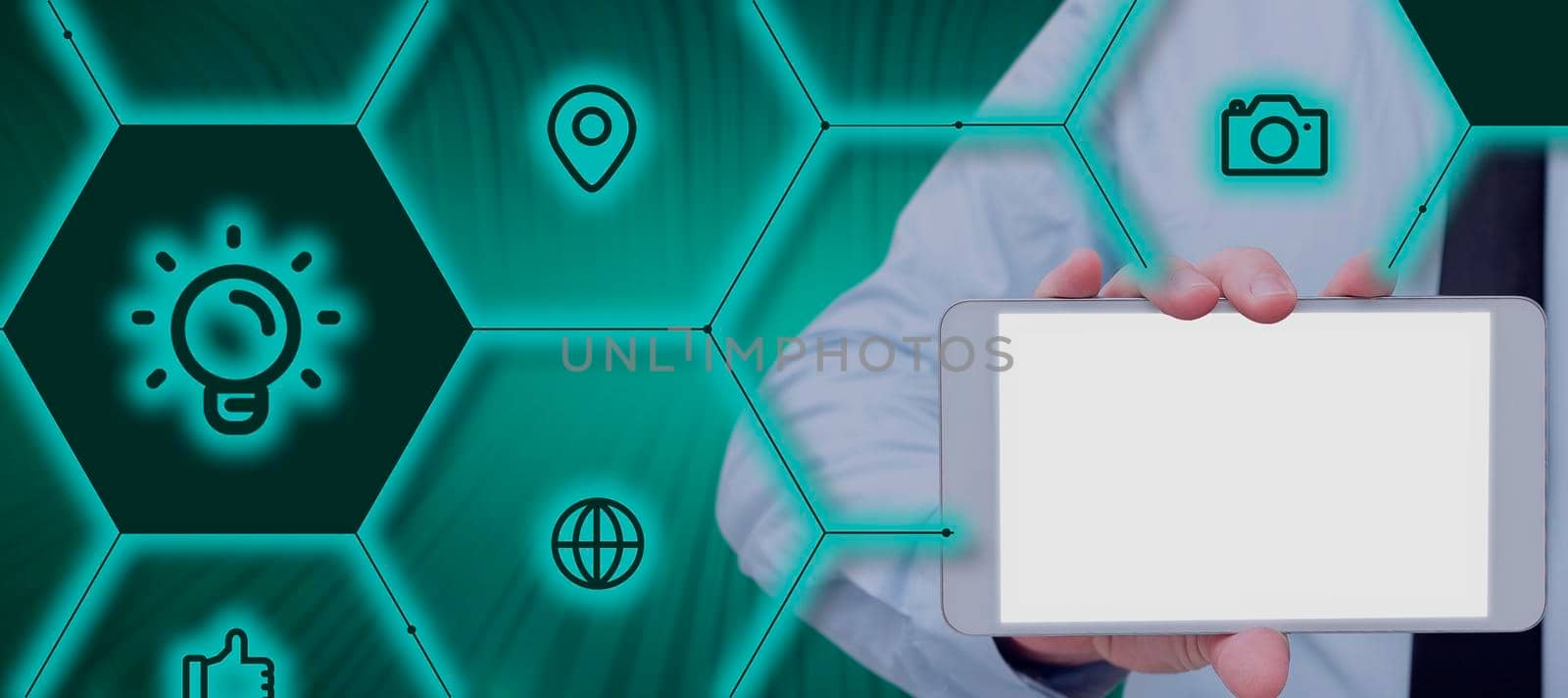 Businessman Holding A Tablet Showing Glowing Digital S In A Graphic Hexagon Frame. A Hand With A Touch Screen Displaying Global Connection And Essential Information. by nialowwa