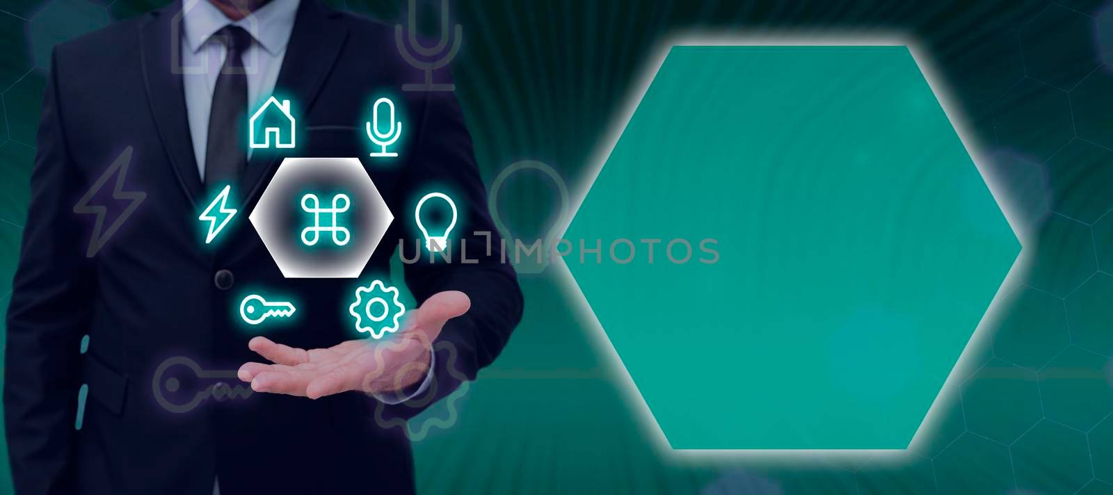 Businessman Holding Futuristic Design In One Hand And Presenting Late Data In Framework. Man In Suit Having Symbols Around Over Palm And Showing Important Informations. by nialowwa