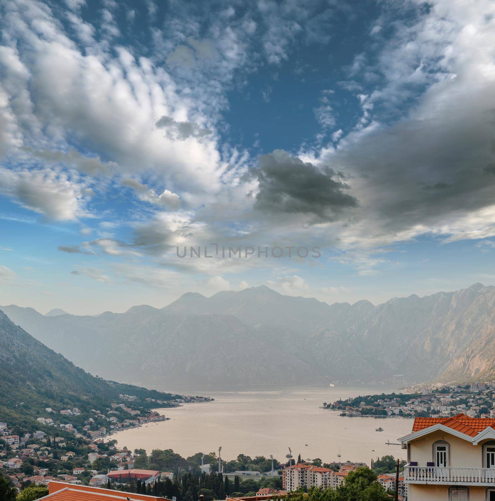 Sunset, beautiful landscape with silhouettes of trees. Travel concept. Montenegro, Kotor Bay. Sunset at Kotor Bay Montenegro. View of the sunset in Boko-Kotor Bay in Montenegro.