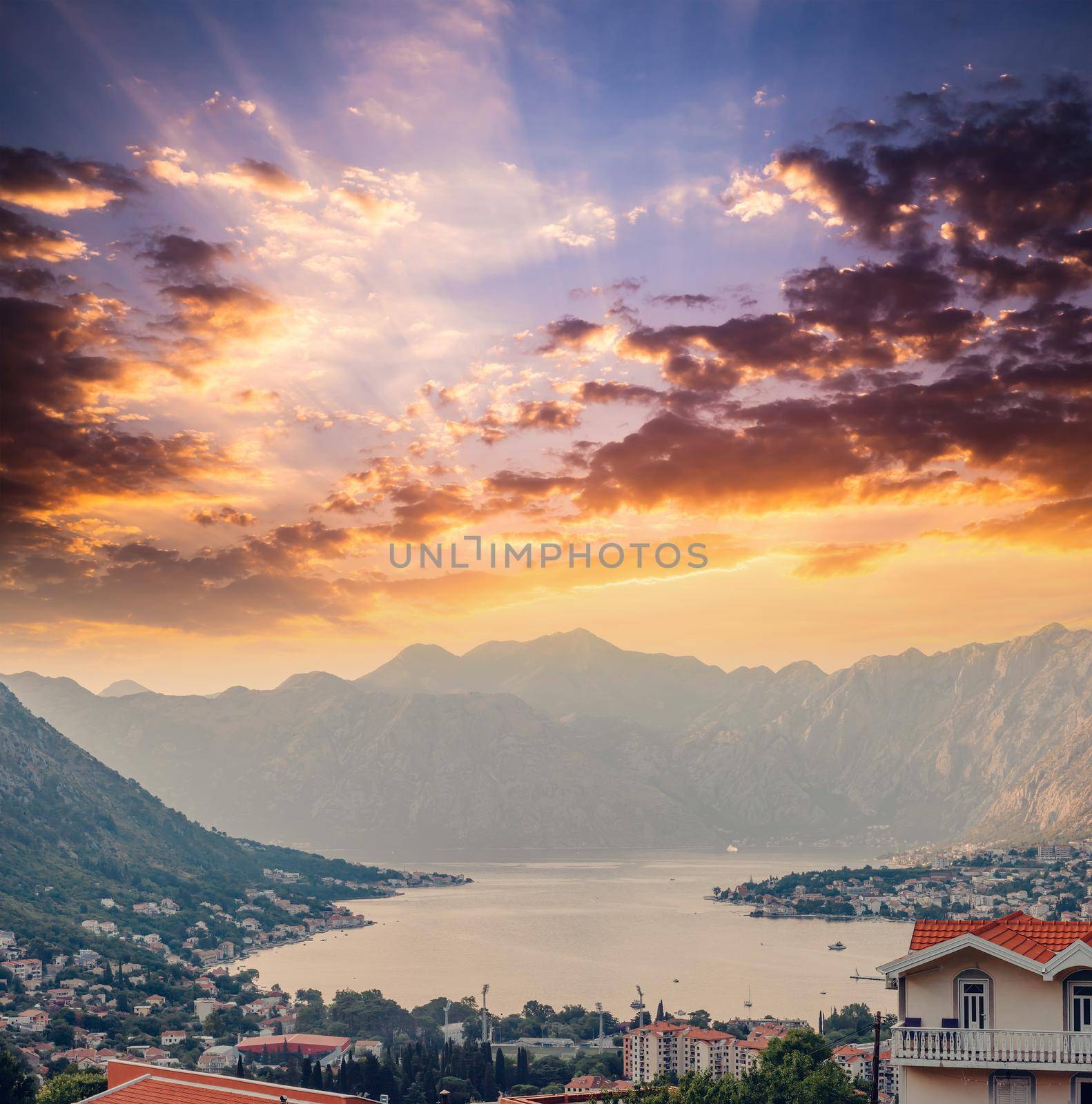 Sunset, beautiful landscape with silhouettes of trees. Travel concept. Montenegro, Kotor Bay. Sunset at Kotor Bay Montenegro. View of the sunset in Boko-Kotor Bay in Montenegro.