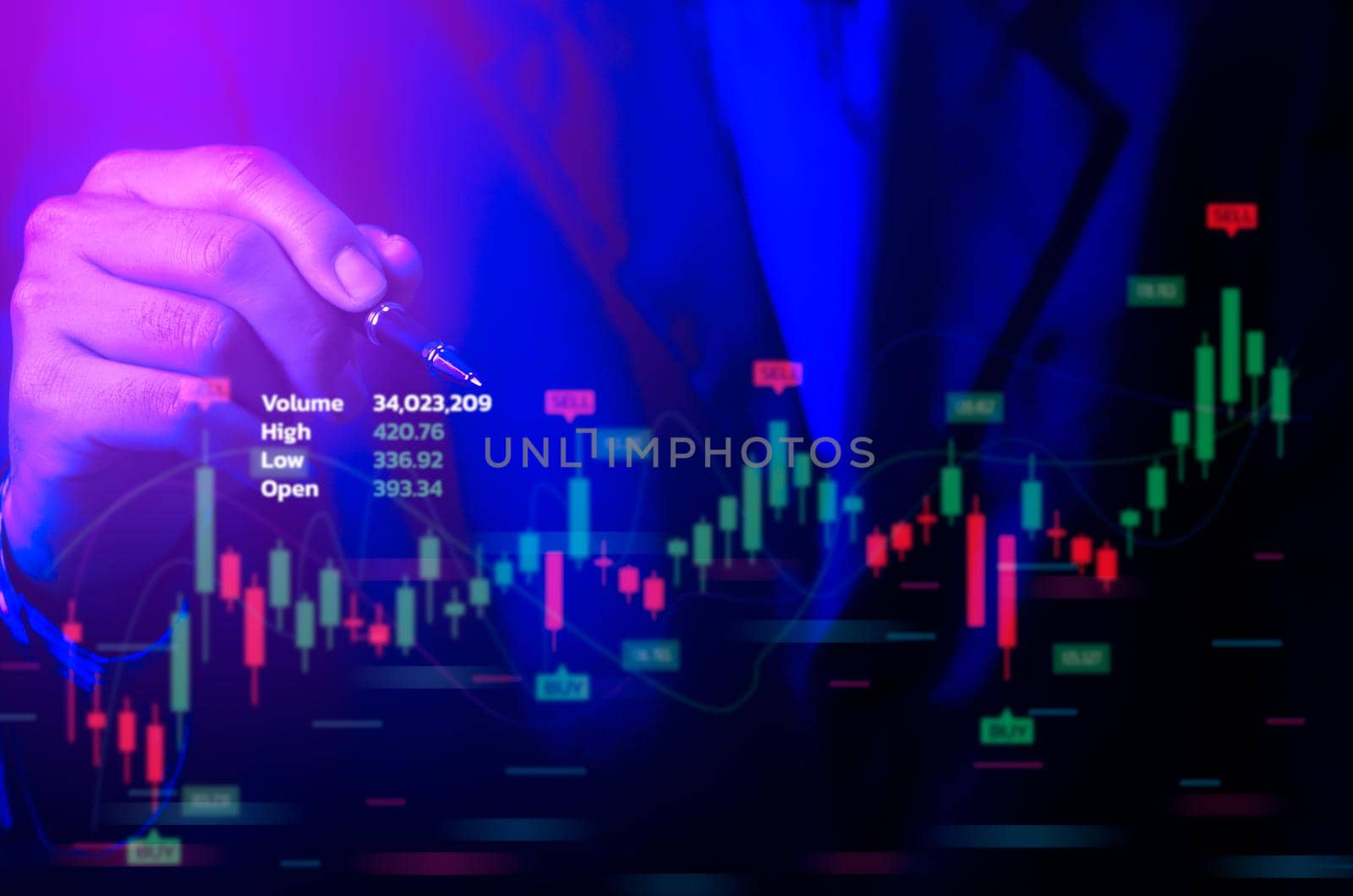 Man pointing with hand at graph of stock market financial exchange statistics and business chart of digital metaverse technology with growth economy concept. by aoo3771