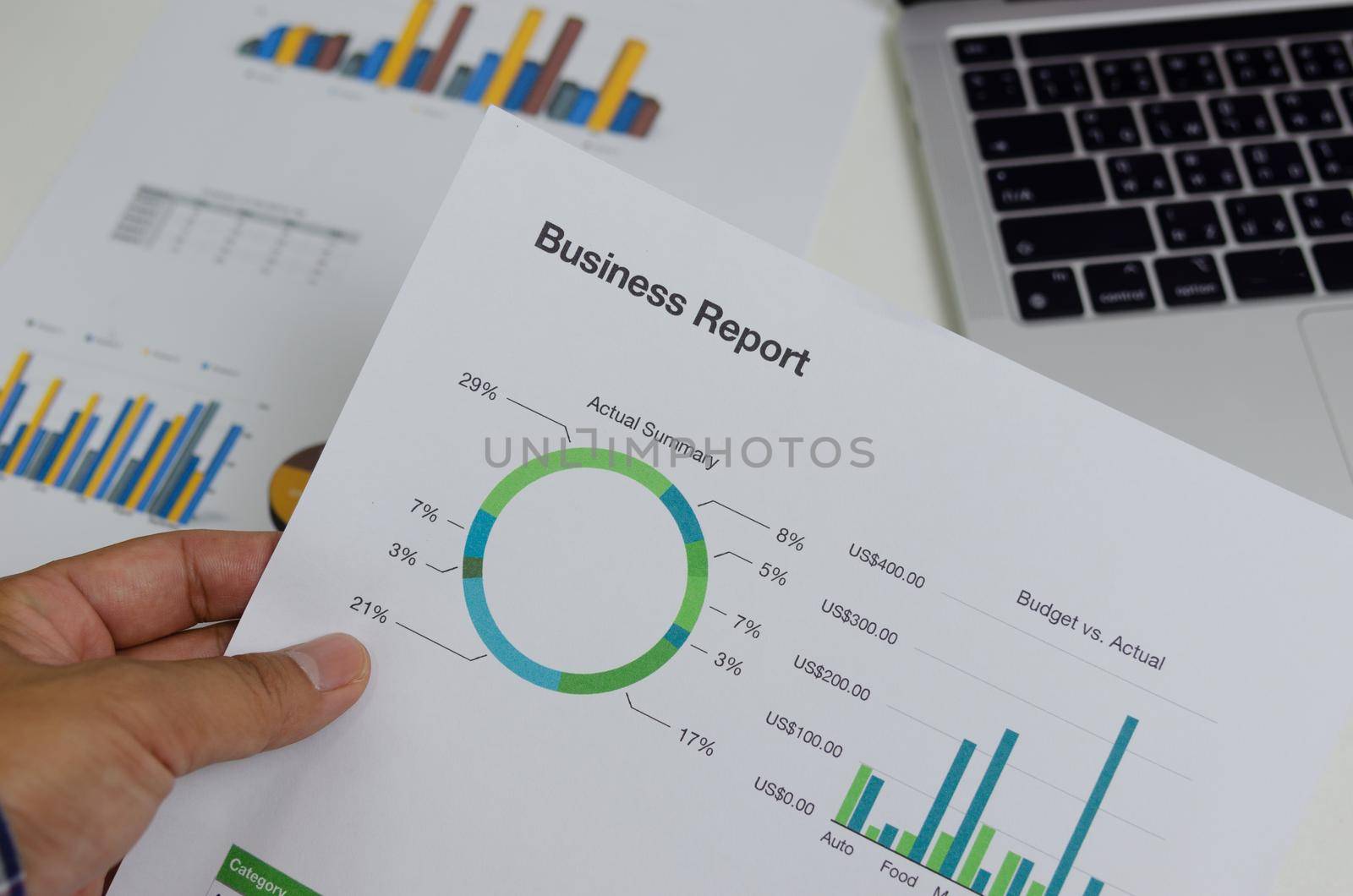 Business document chart report financial and graph statistic analysis management information and research investment plan sale on desk at office. by aoo3771