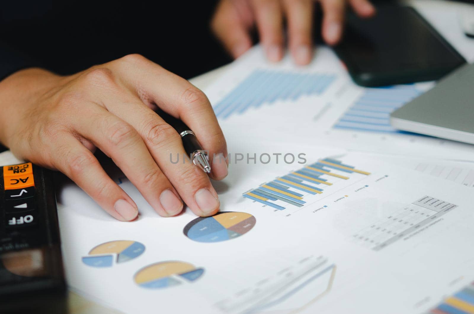 businessman data document graph chart report marketing research development working at office with laptop. by aoo3771