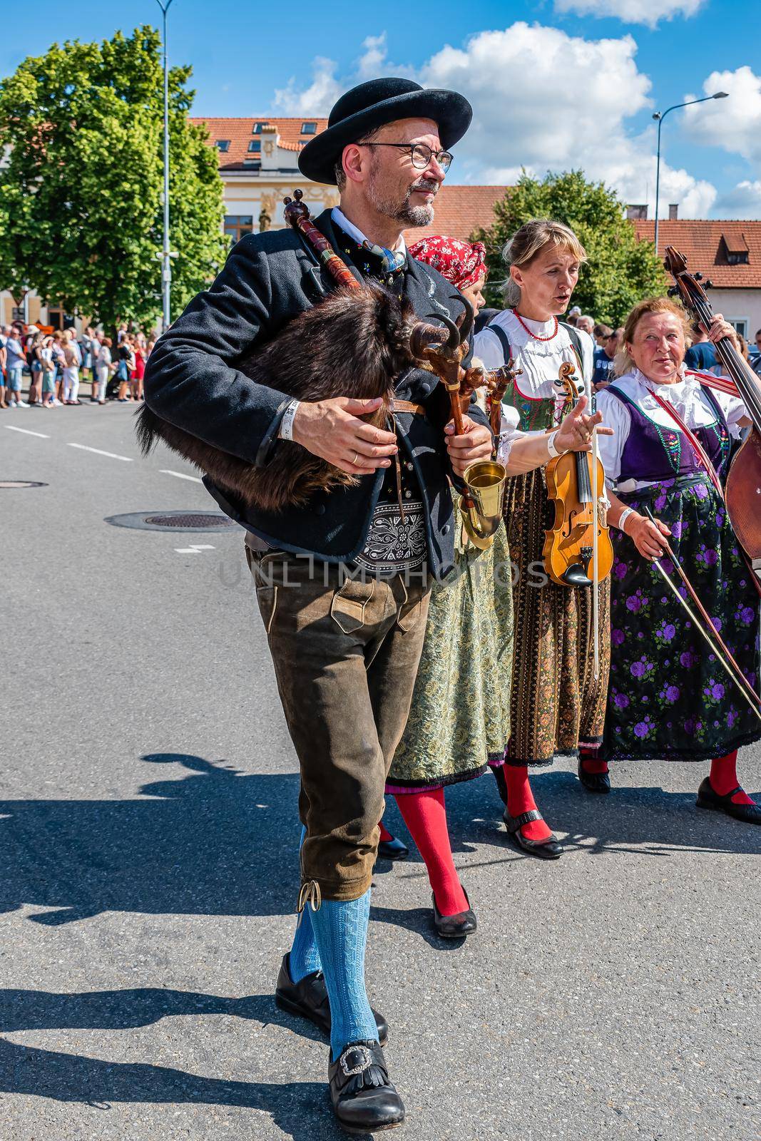 Straznice, Czech Republic - June 25, 2022 International Folklore Festival. Woodpecker playing at the festival in Straznice in a procession