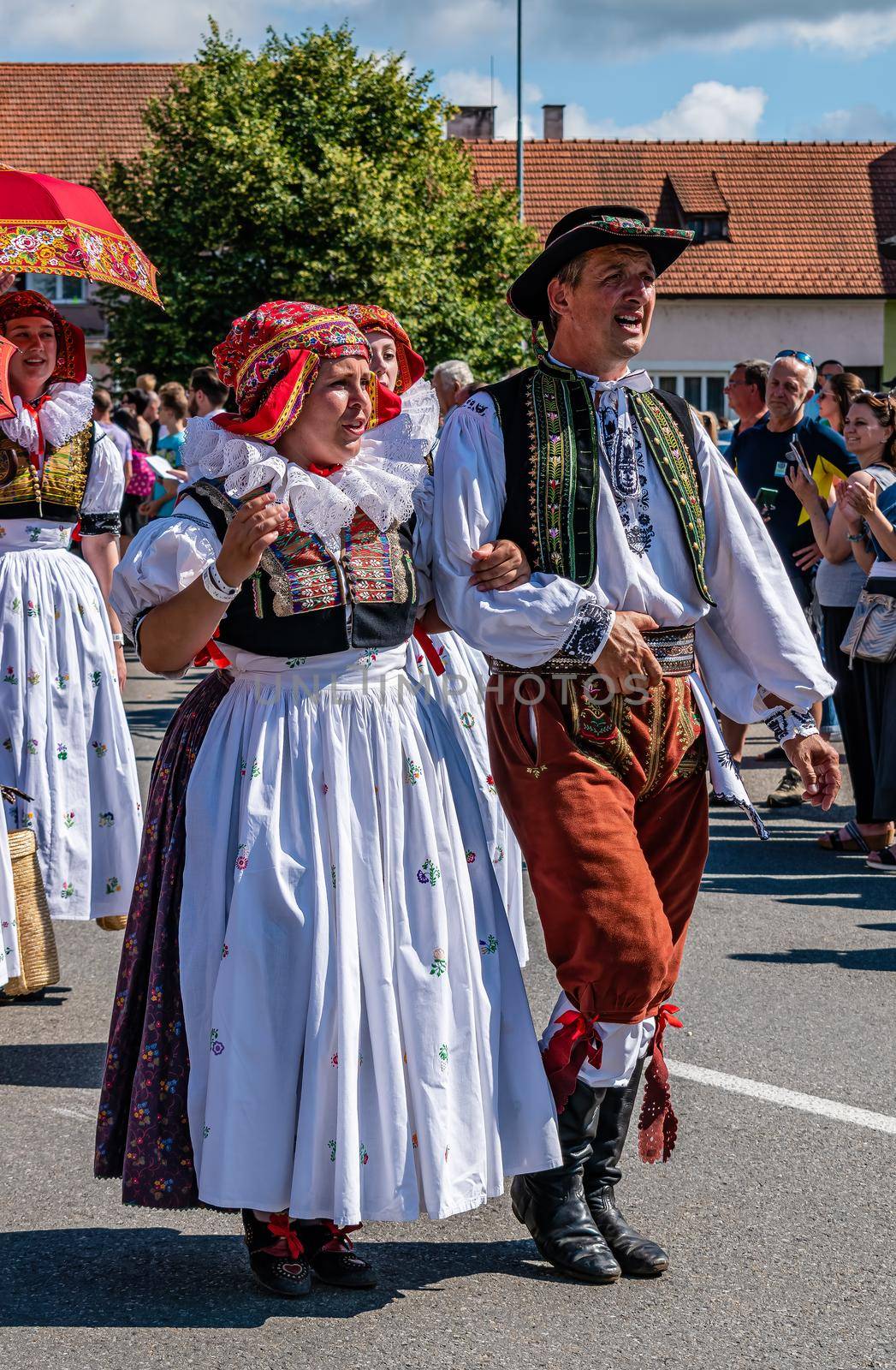 Straznice, Czech Republic - June 25, 2022 International Folklore Festival. Woman and man in hanack costume in procession