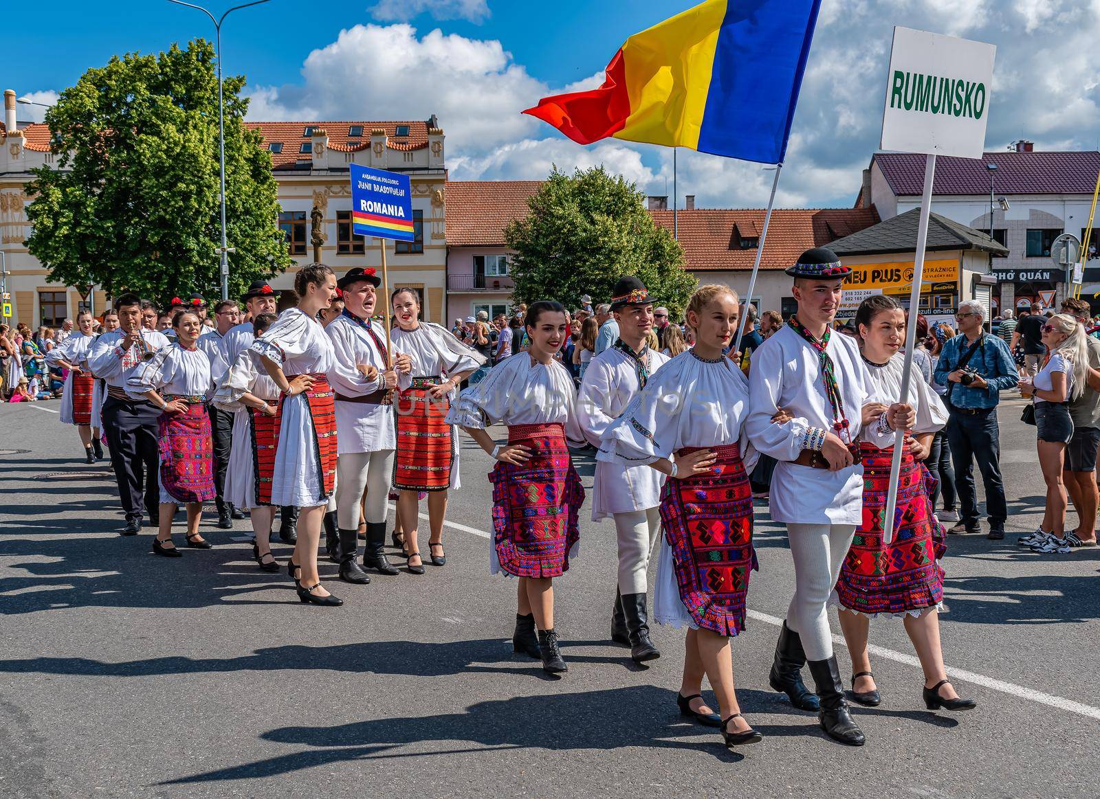 Straznice, Czech Republic - June 25, 2022 International Folklore Festival. Men and women in Romanian folk costumes