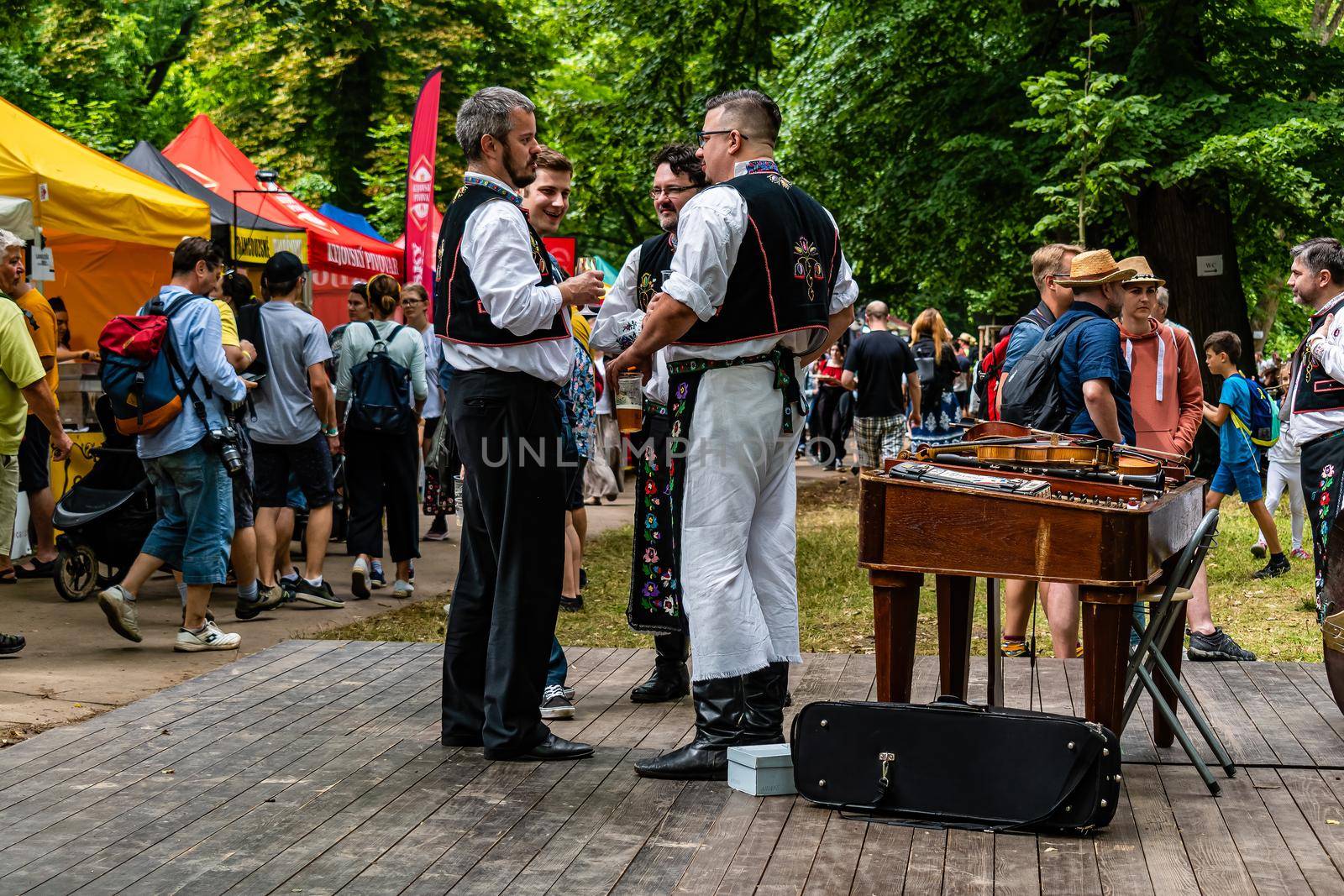 Straznice, Czech Republic - June 23, 2022 International Folklore Festival Musicians in costumes prepare for performances