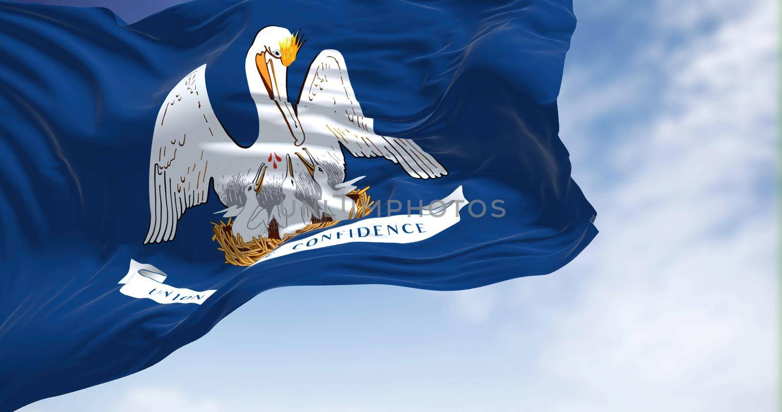 The US state flag of Louisiana waving in the wind. Louisiana is a state in the Deep South and South Central regions of the United States. Democracy and independence.