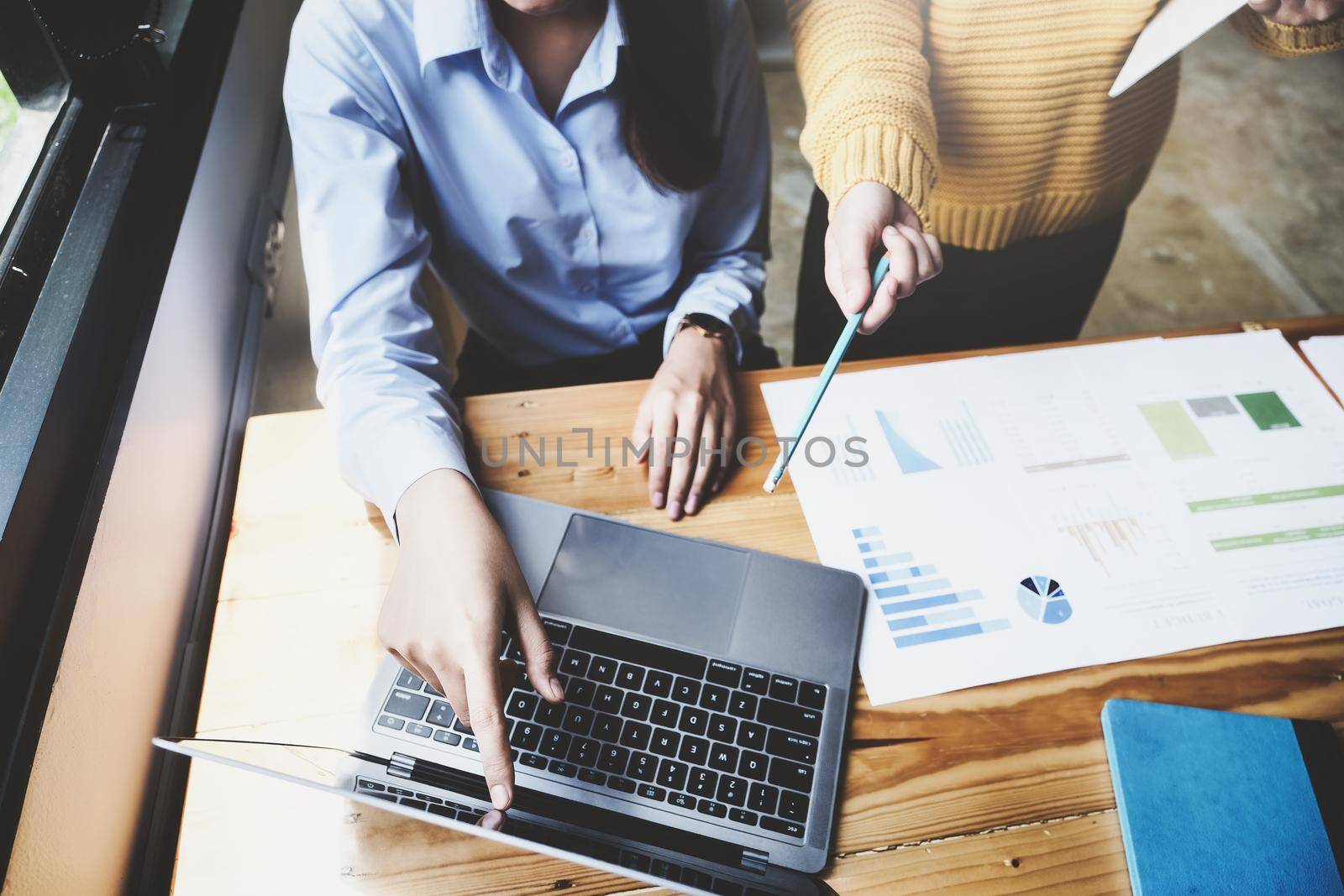 A female business consultant describes a marketing plan to set business strategies for women business owners