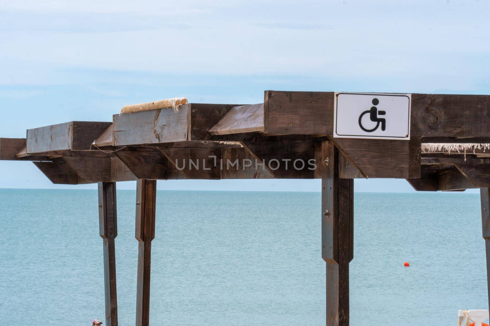 Beach sign sea people disabled disability wheelchair handicapped outdoor person, for outside accessibility for blue from tropical impairment, resort ocean. Out parasol ramp,