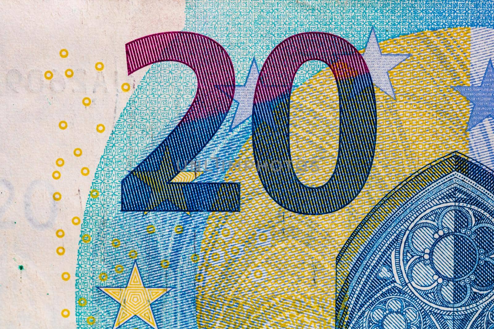 Selective focus on detail of euro banknotes. Close up macro detail of money banknotes, 20 euro isolated. World money concept, inflation and economy concept by vladispas