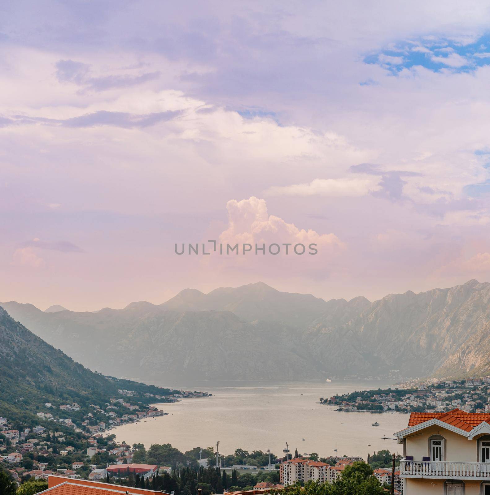 Sunset, beautiful landscape with silhouettes of trees. Travel concept. Montenegro, Kotor Bay. Sunset at Kotor Bay Montenegro. View of the sunset in Boko-Kotor Bay in Montenegro.