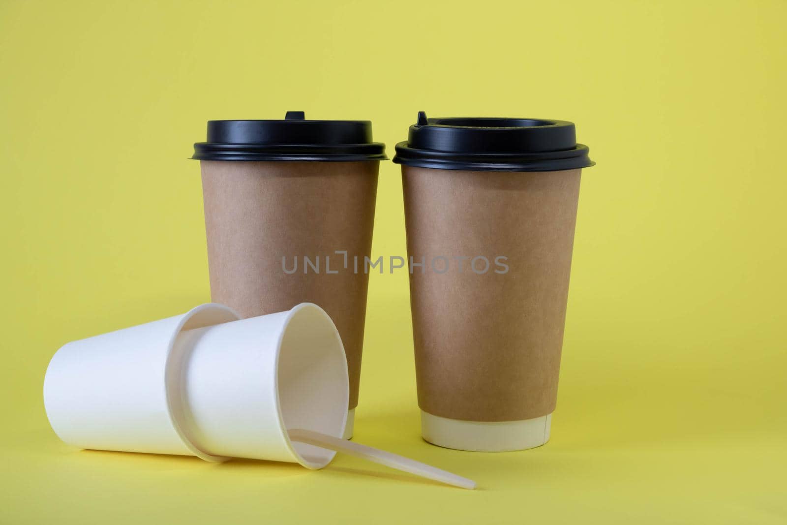 Paper disposable cups for coffee and drinks. Takeaway food.