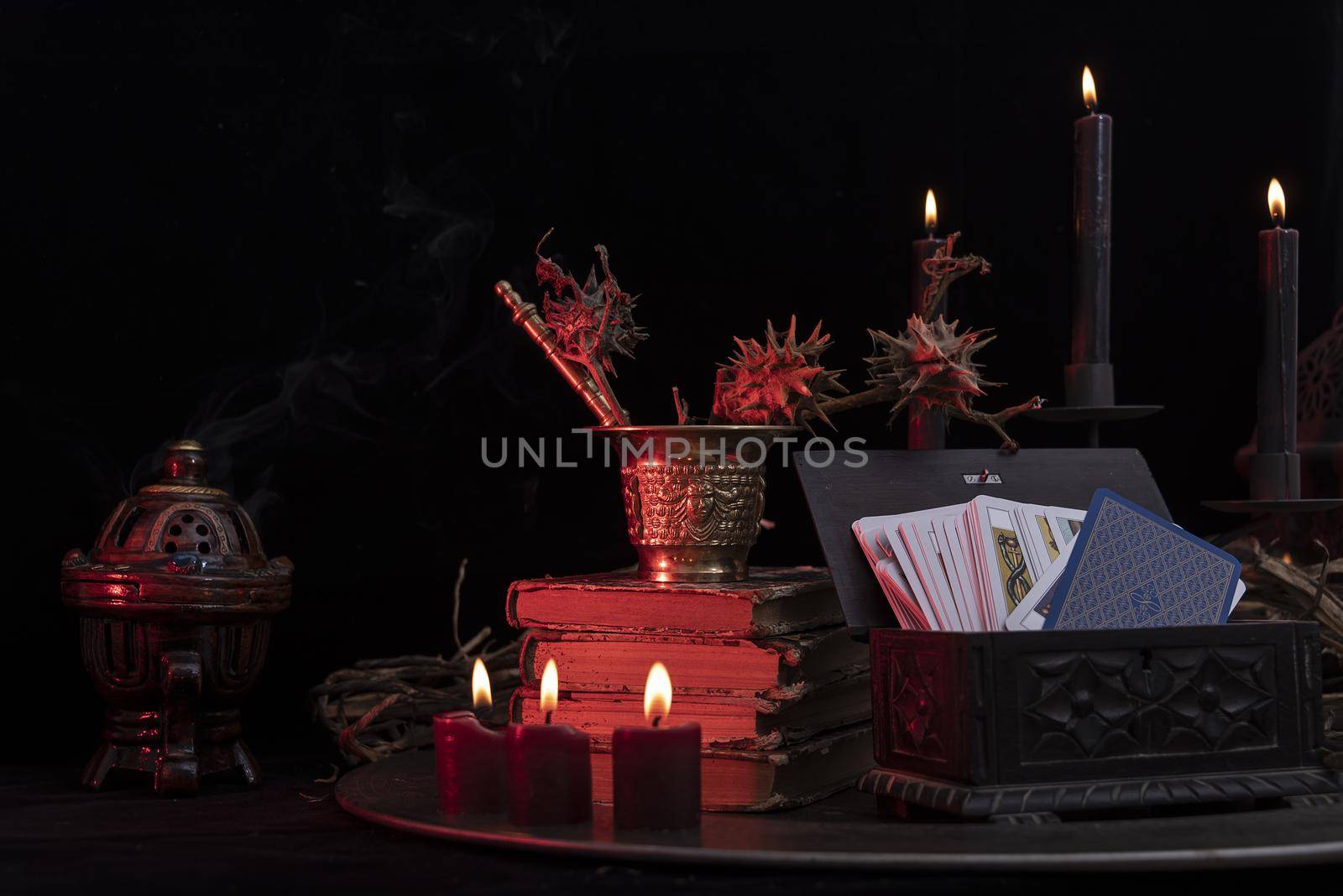 Witch laboratory with potion, elixirs, glass bottles, dry flowers, herbs and ingredients. Esoteric, wicca and occult background, fortune telling and divination ritual, mystic concept