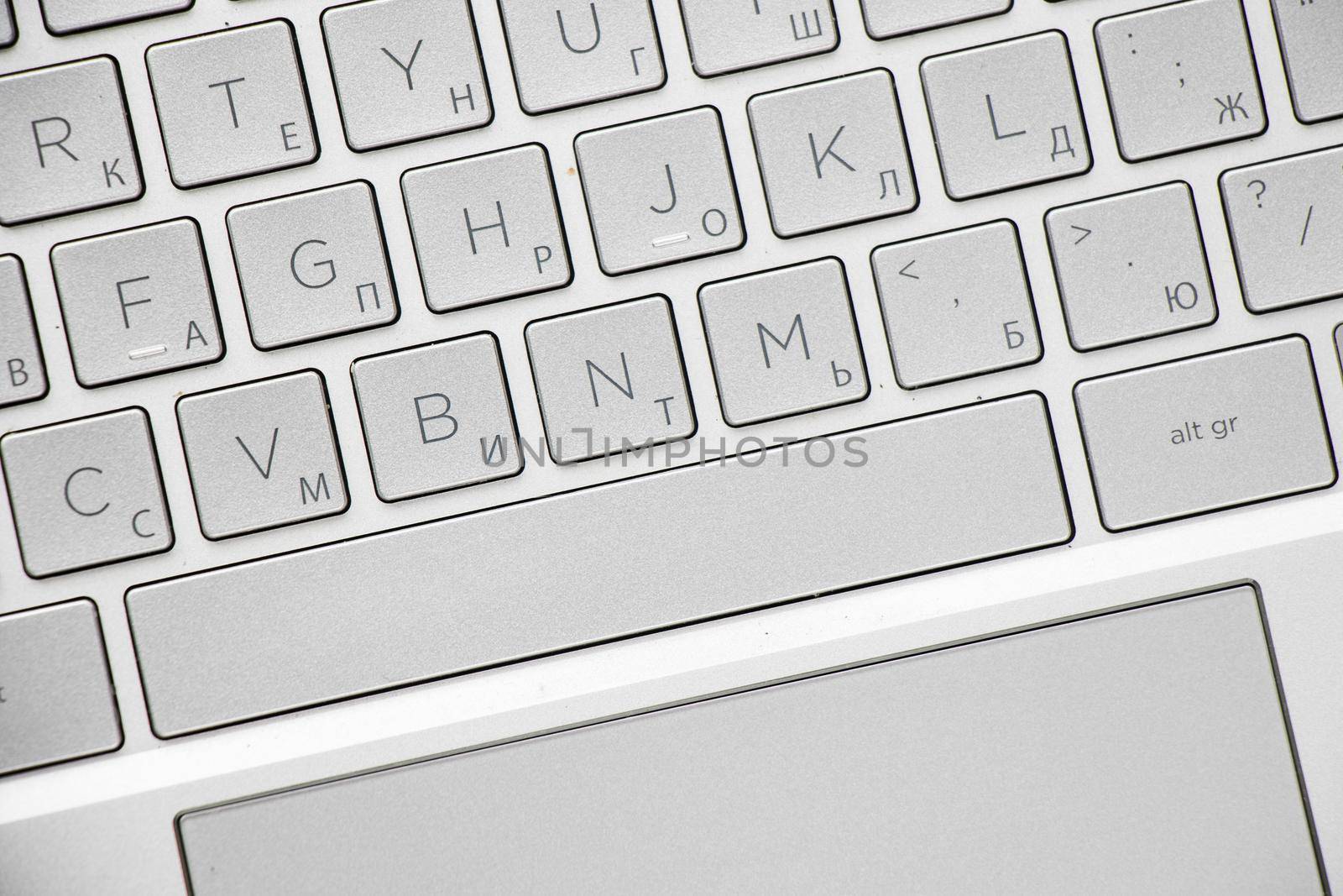 Laptop and notebook computer keyboard close-up, texts, keys by Taidundua