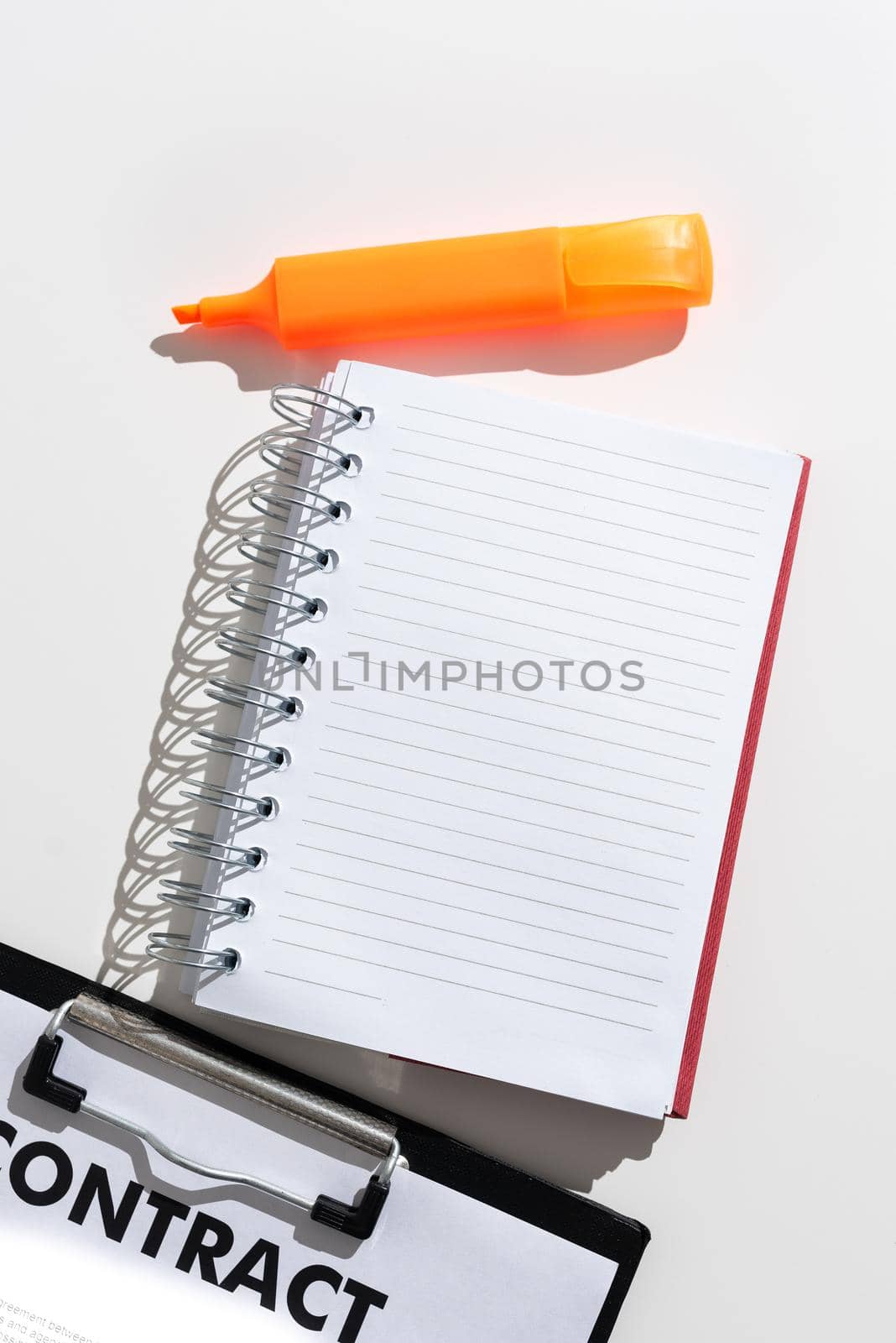 Notebook With Important Message With Marker And Clipboard. Notepad With Crutial Informations On Desk With Colored Pen. Critical Announcement Written On Paper. by nialowwa