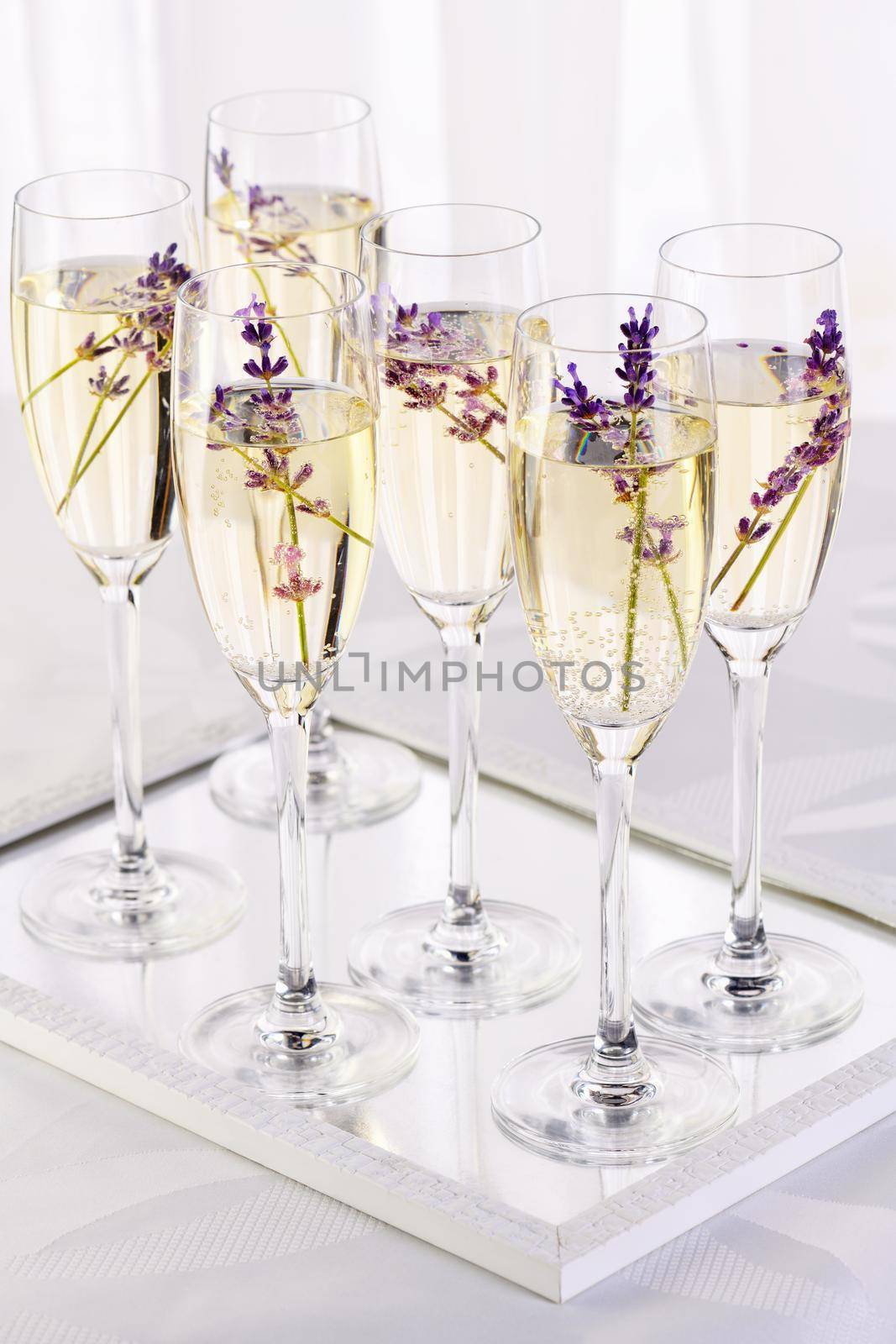 Lavender mood. Champagne with soft gentle notes of lavender. Drink for a wedding dinner. Wedding theme ideas.