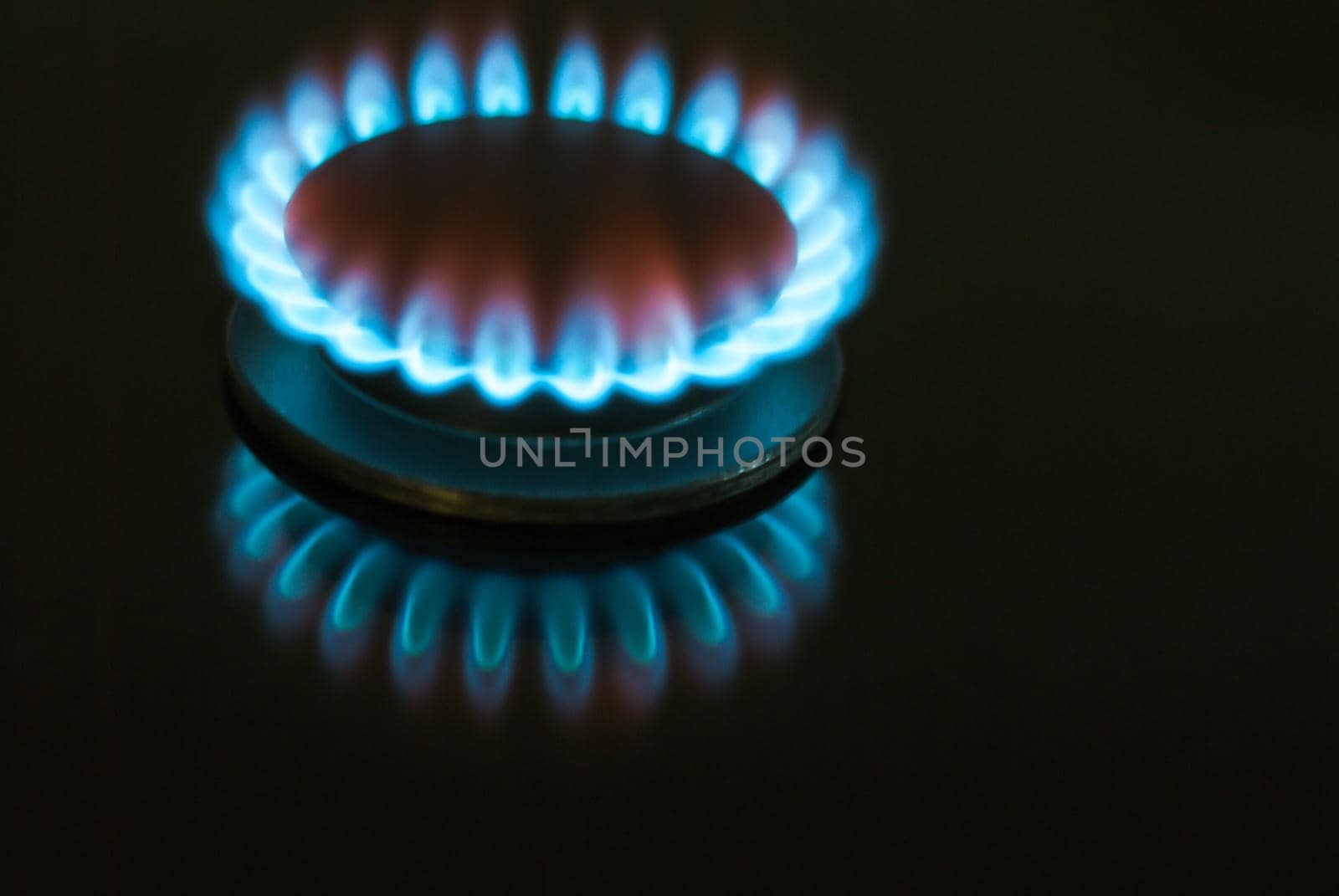 gas burner on black background by maramorosz