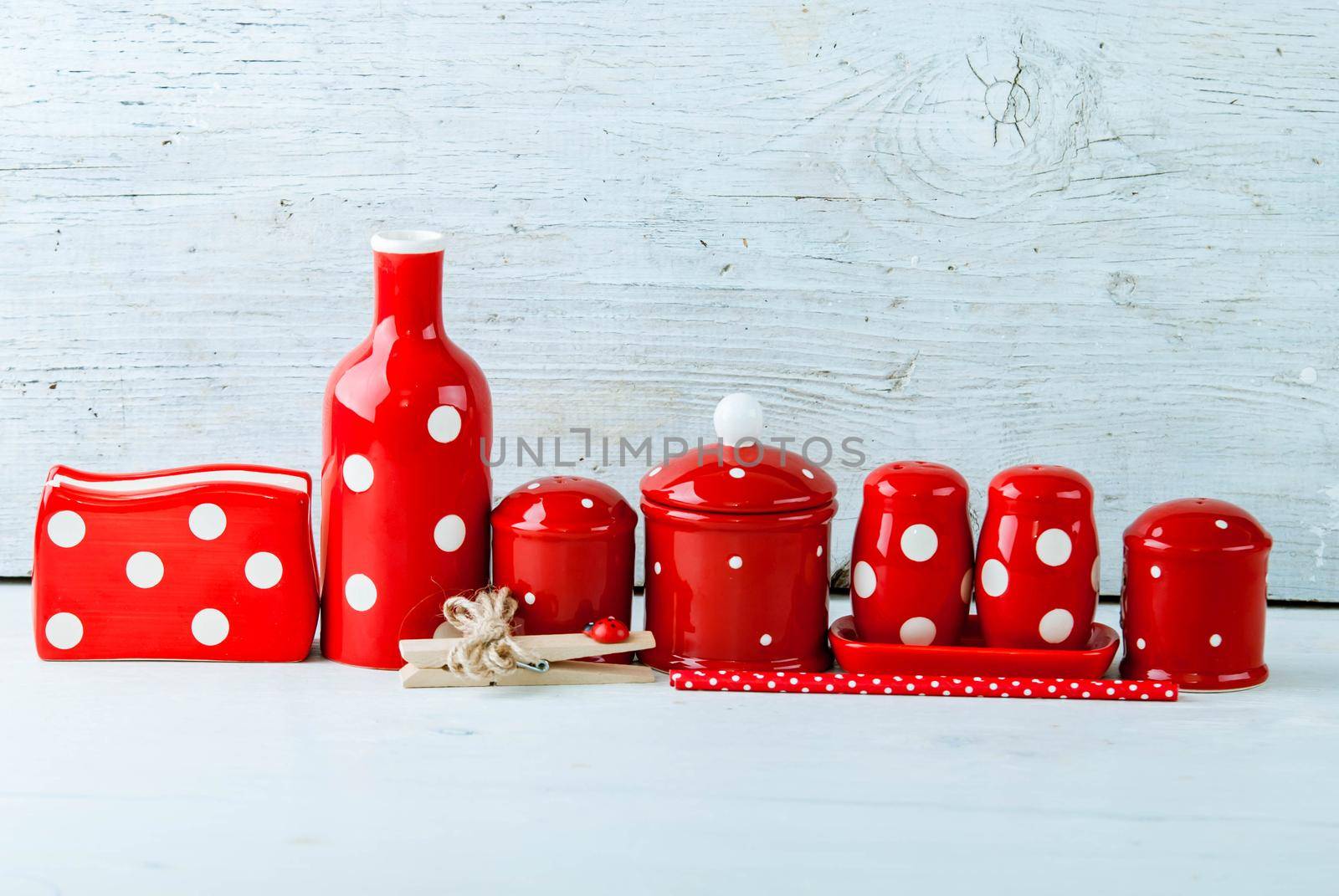 home kitchen decor polca dots for oil, salt, sugar and peper on wooden background