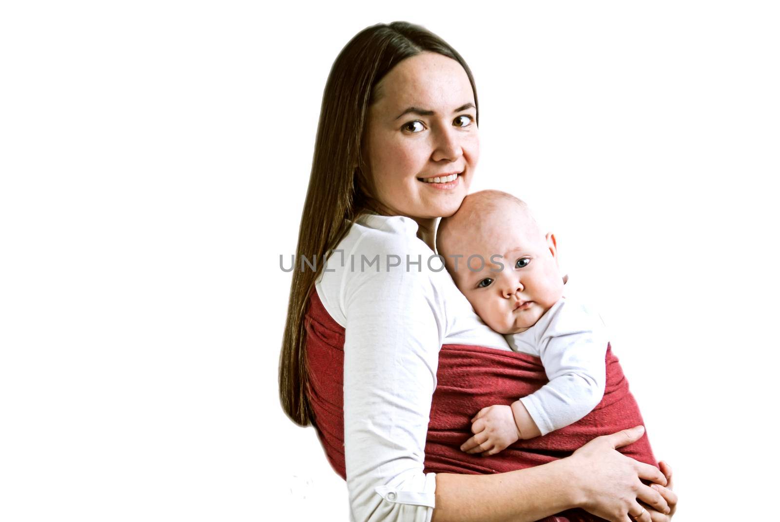 Mother carring baby in sling. High quality photo