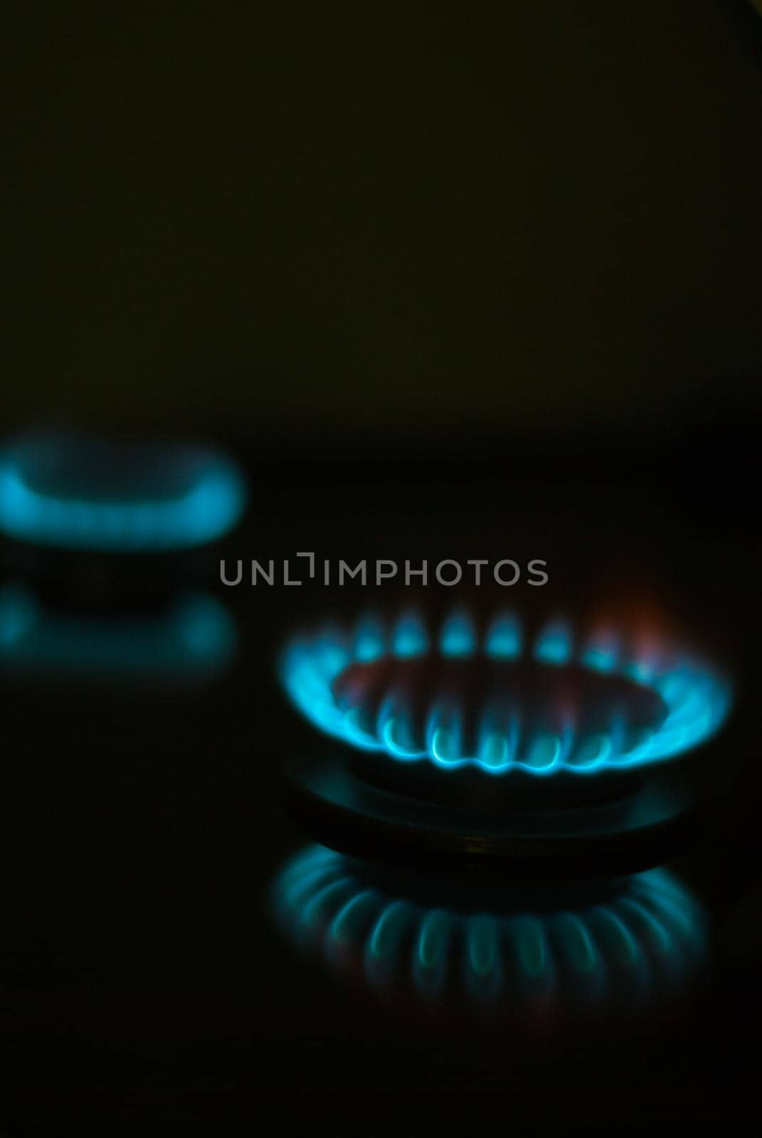 gas burner on black background by maramorosz