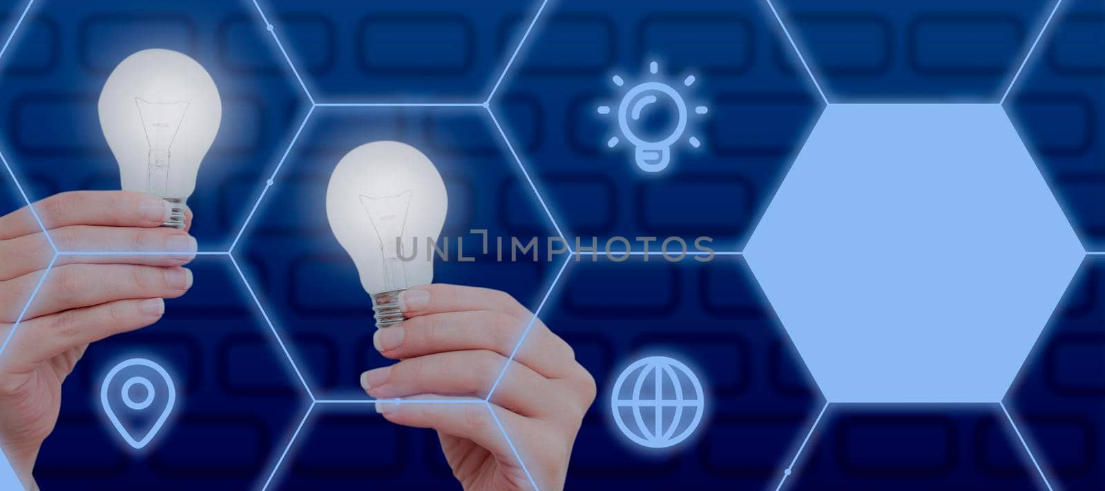 Hands Of Businesswoman Holding Electric Bulbs In Digitally Generated Hexagon With Multiple S. Woman With Lights Presenting New Ideas And Strategies For Business Progress. by nialowwa