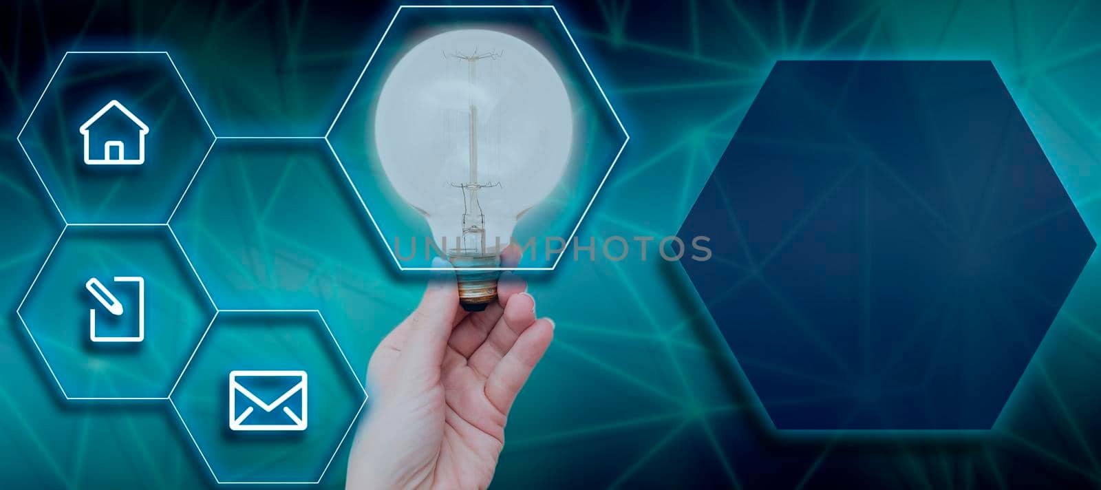 Businesswoman Hand Holding Electric Bulb With Digitally Generated Hexagon Shapes And Multiple S. Woman With Light Presenting Important Messages And Information. by nialowwa