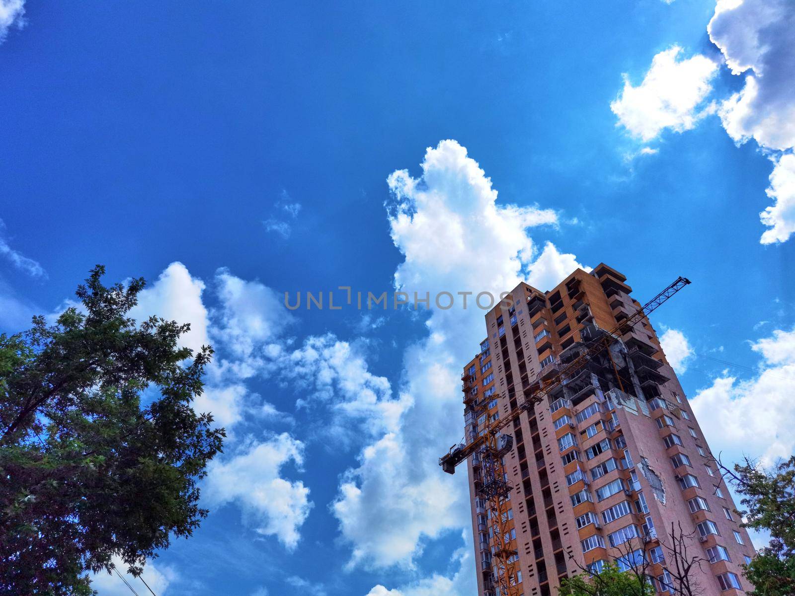 Kyiv, Ukraine - July 10, 2022: The building renovation after Russian rocket attack on Kyiv