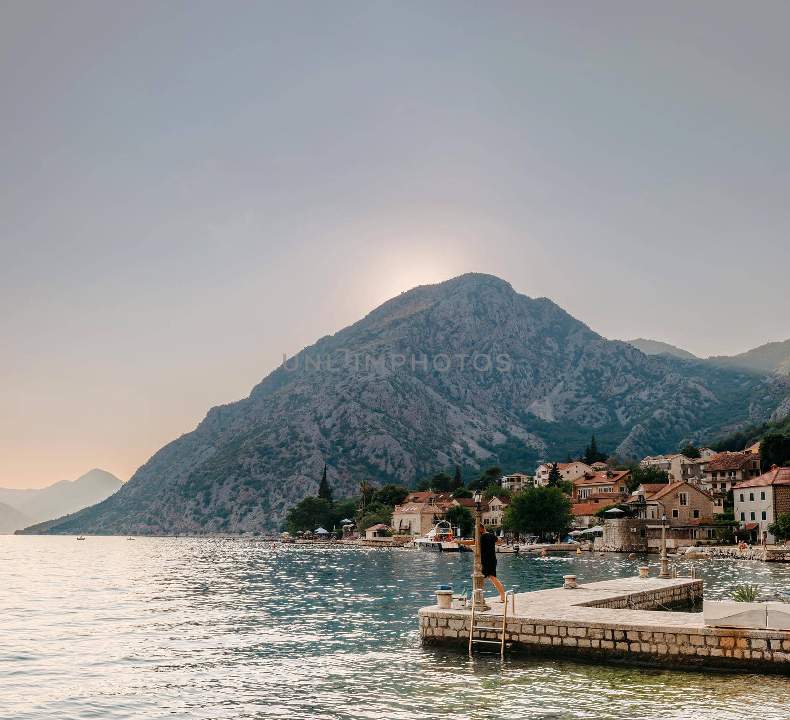 Fishing Boat On An Oyster Farm In The Bay Of Kotor, Montenegro. High Quality Photo by Andrii_Ko