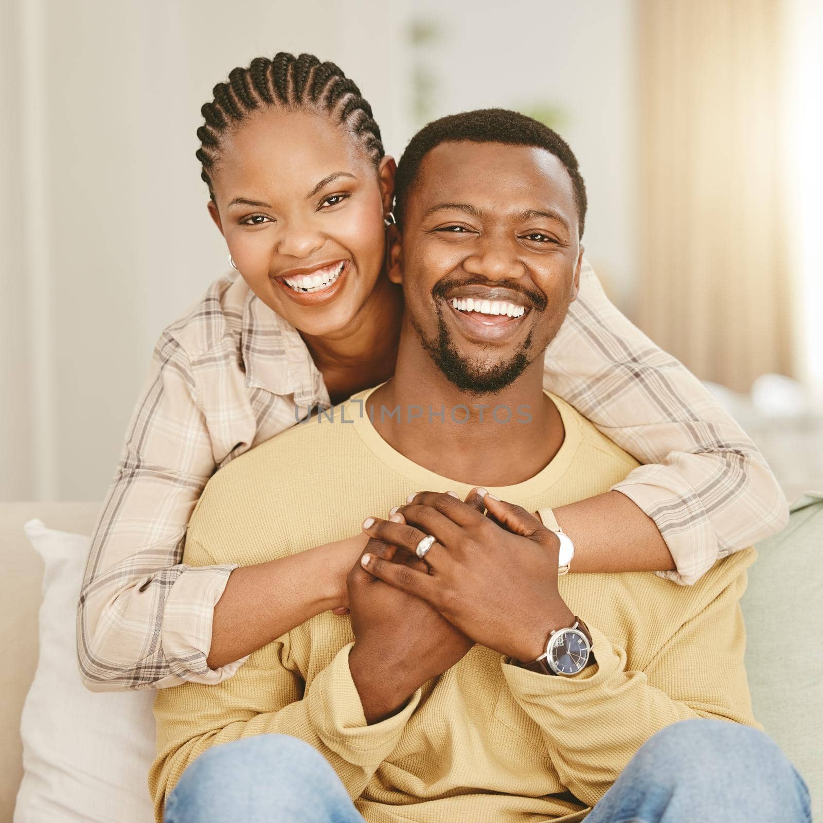 When love comes around, hold on to it. an affectionate couple spending time together at home