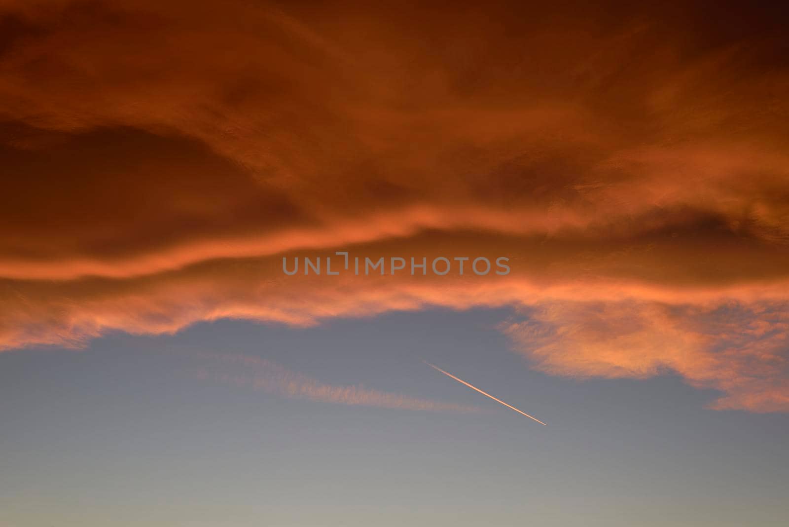 A Sky light after sunset. orange background by raul_ruiz