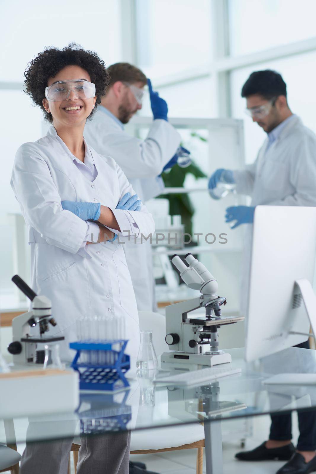 Scientists smiling together in lab