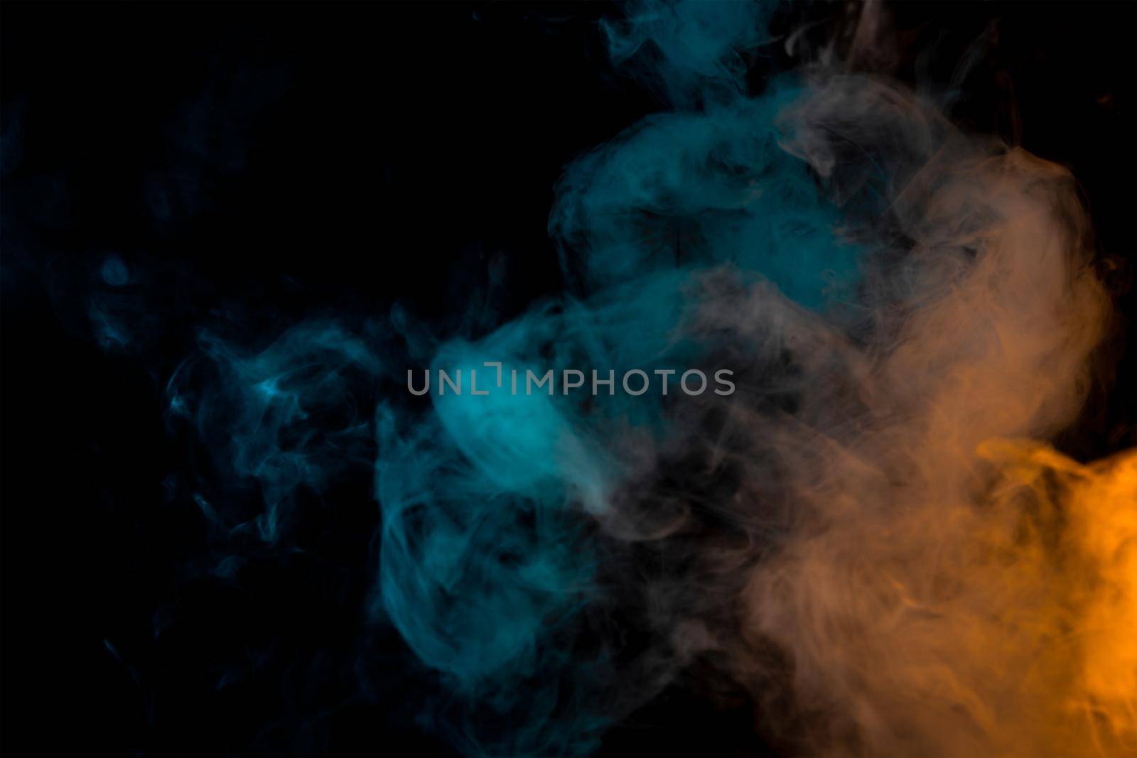 movement of a cloud of cigarette vapour in different colours degrading from orange to blue, on dark background. banner with illuminated coloured smoke. by CatPhotography