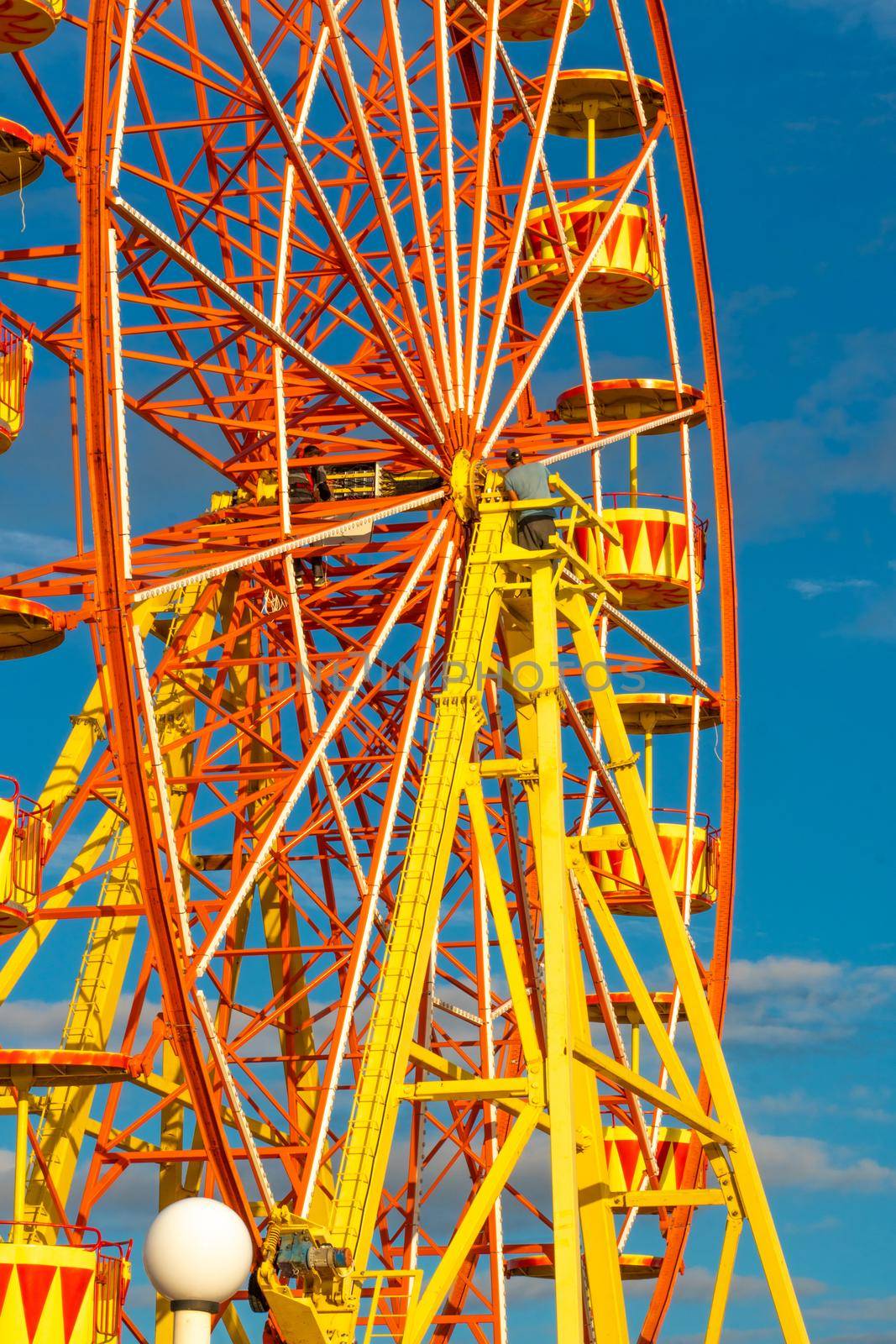 Repairing park booth carousels wheel ferris city repairman mobile repair, from specialist swing for game and baby childly, editorial fix. Holiday attraction, by 89167702191