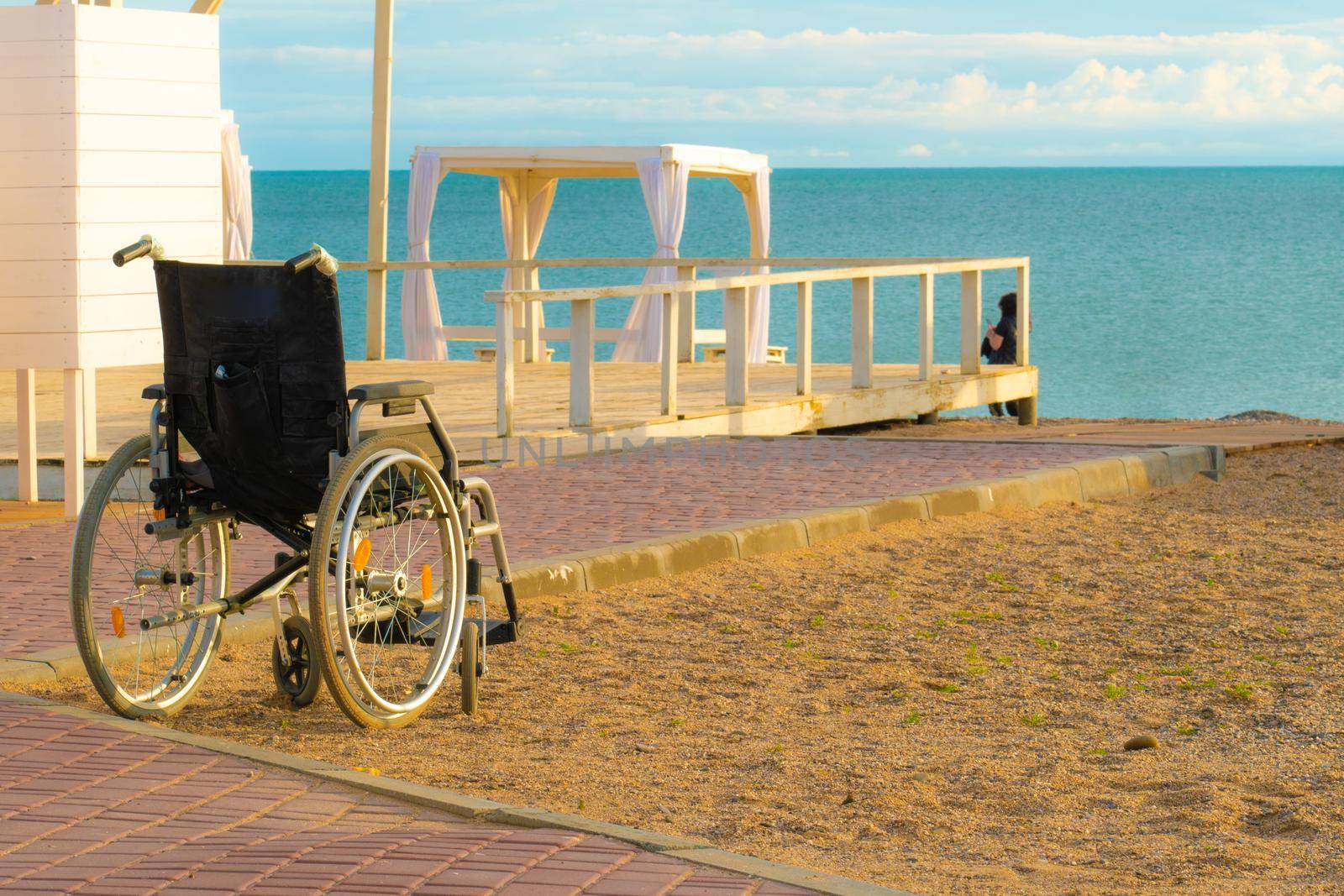 Locker room holiday beach sea wheelchair disabled happy travel family lifestyle, concept vacation summer for adult and sunrise chair, special people. Boy care love, by 89167702191