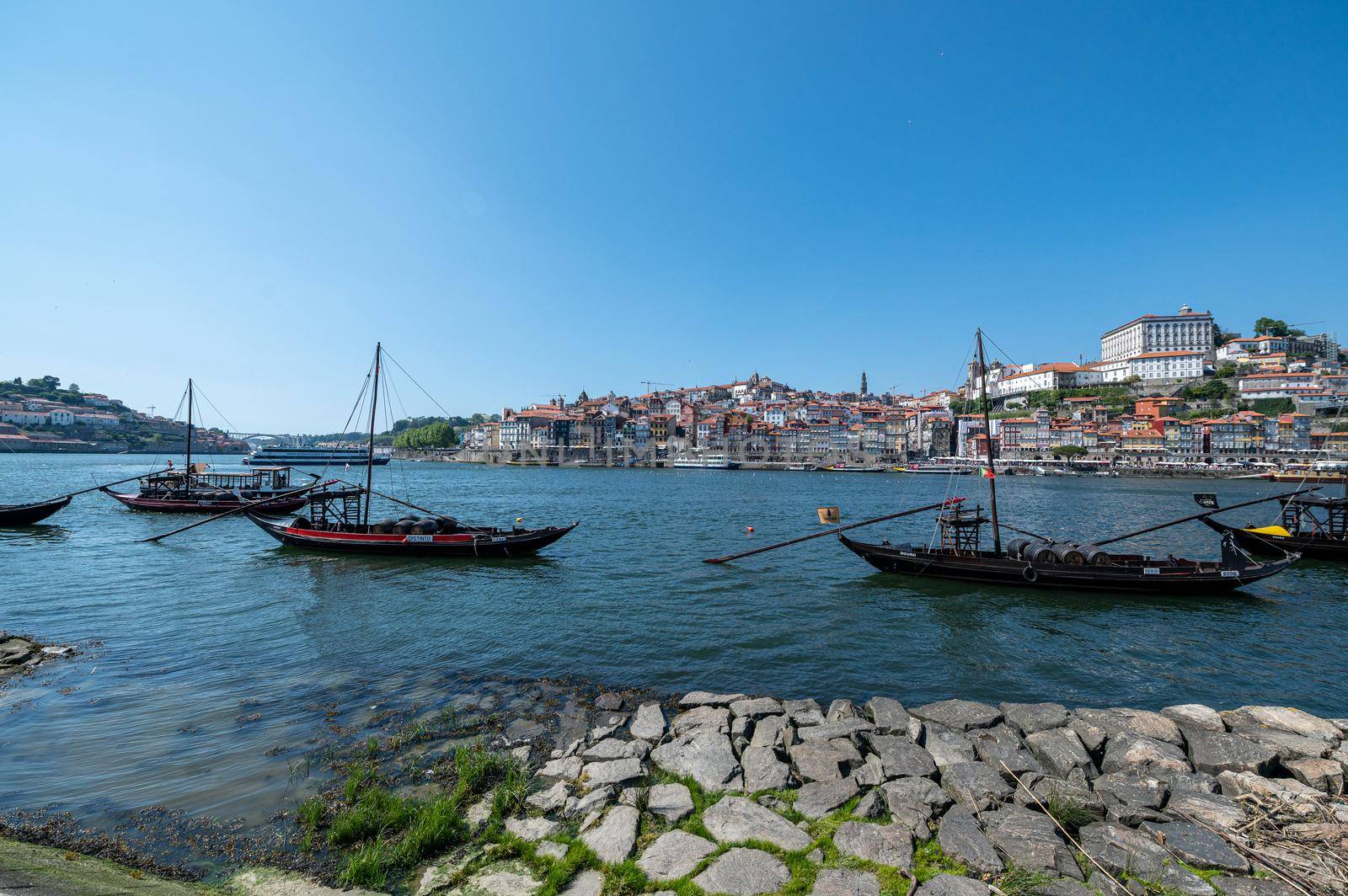 Port, Portugal. 2022 May 26 . Old wine boats on the coast of the Rio Douro in Porto, Portugal.