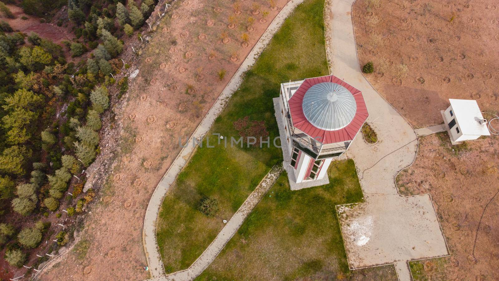 29 December 2020 Eskisehir Turkey. Scenery tower in Eskisehir city forest among the pine trees aerial drone view