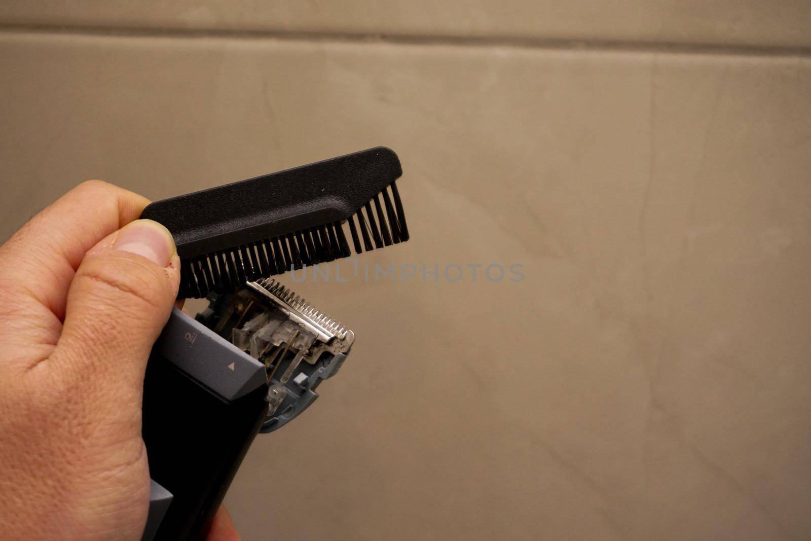 Hair trimmer charge and maintenance close up view by tasci