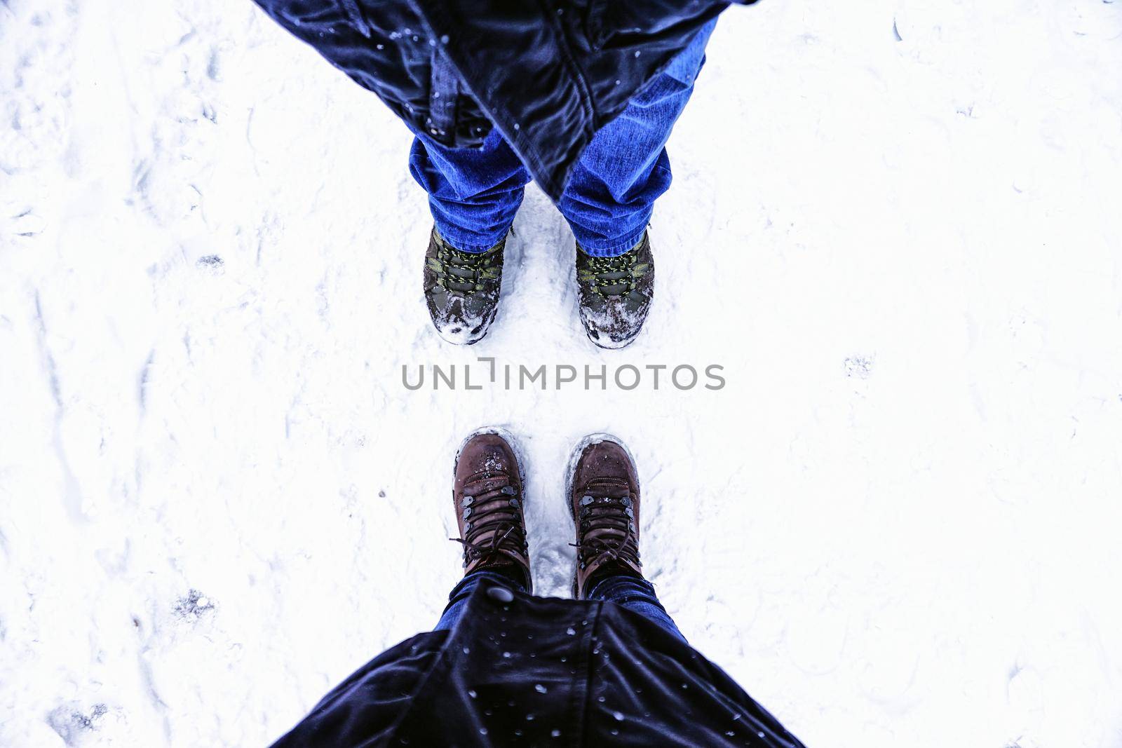 Snow walk in winter with snow boots