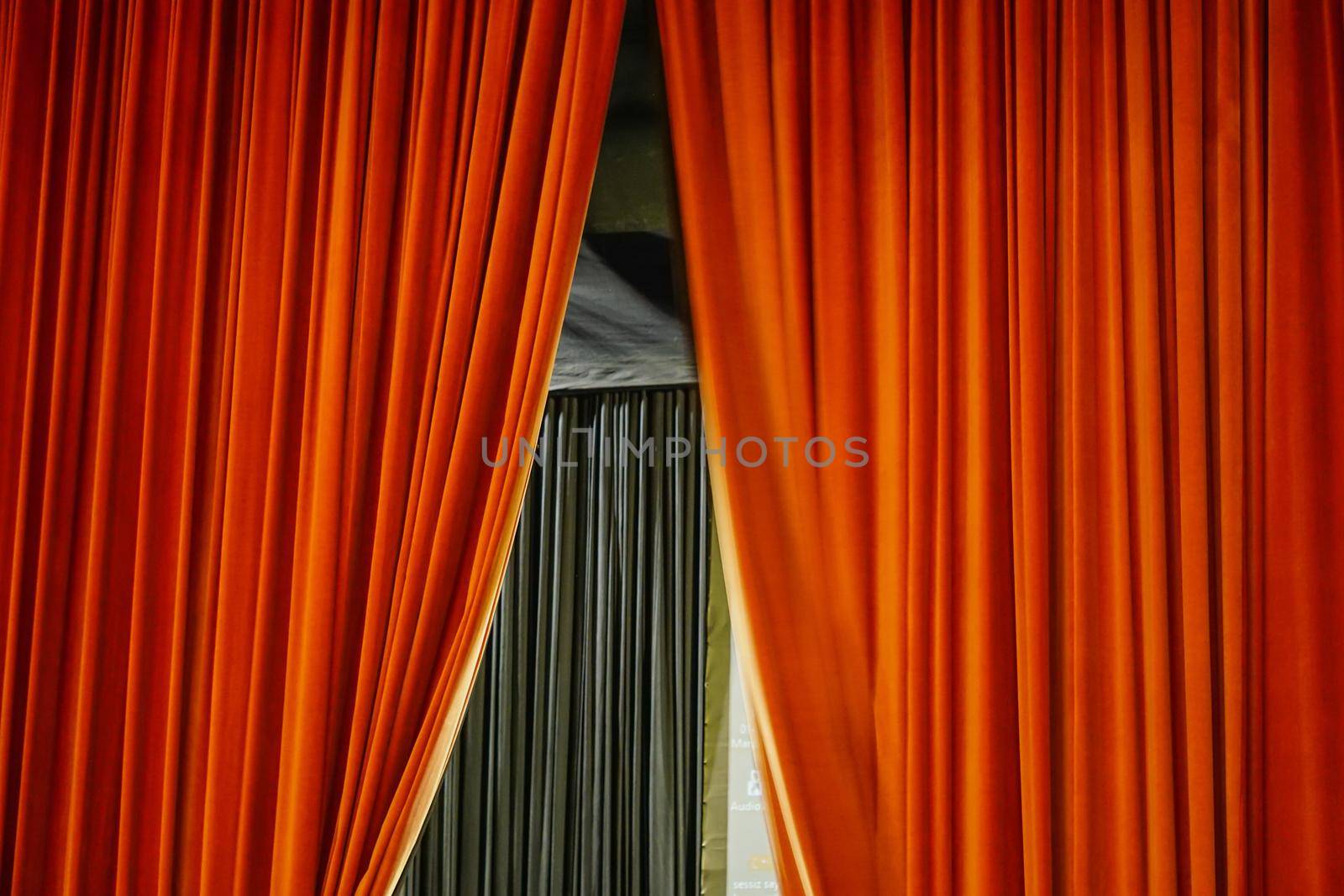 Red stage curtain at the theatre