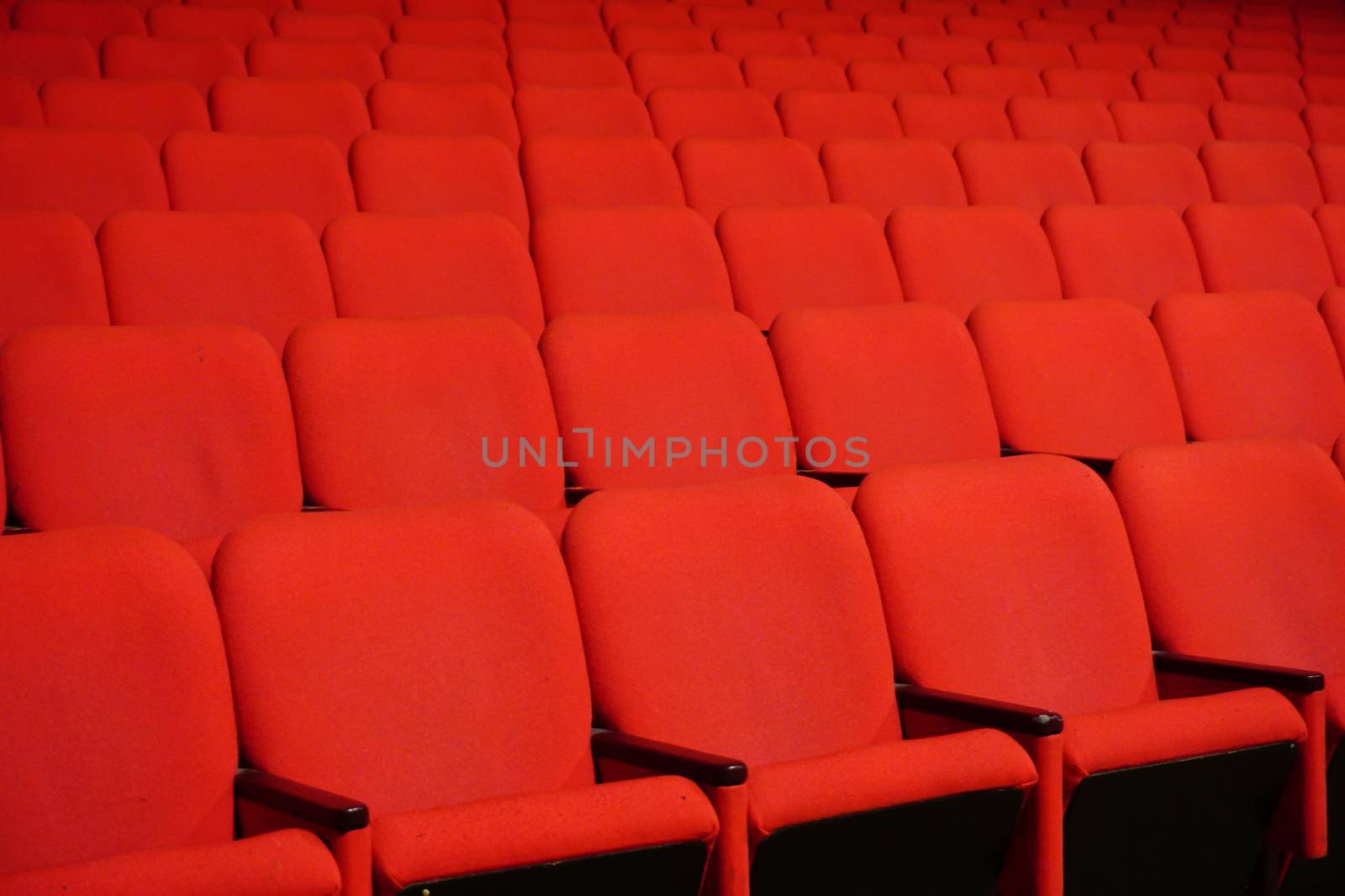 Red theater seats in a row