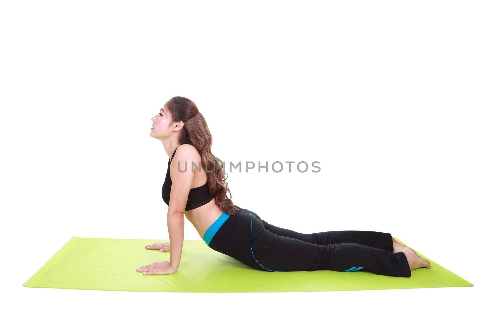 Young woman doing yoga exercise with yoga mat isolated on white background