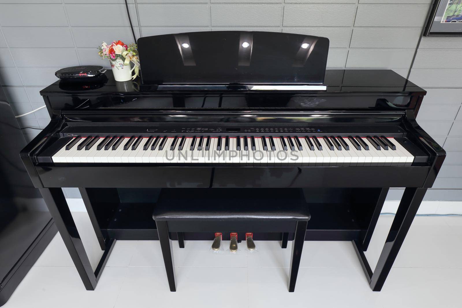 A black electronic piano by geargodz