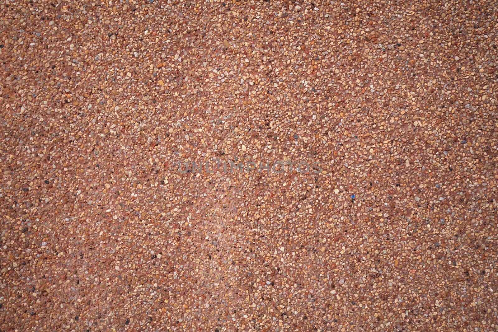 brown small granite stone wall background texture