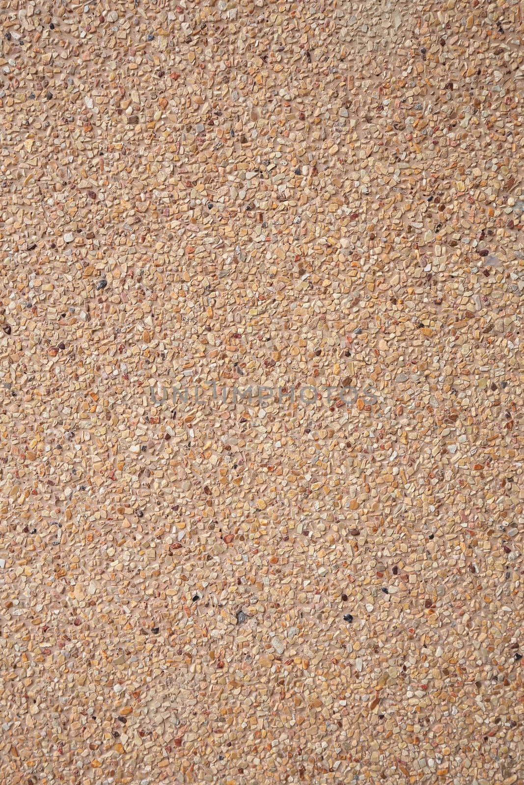 brown small granite stone wall background texture