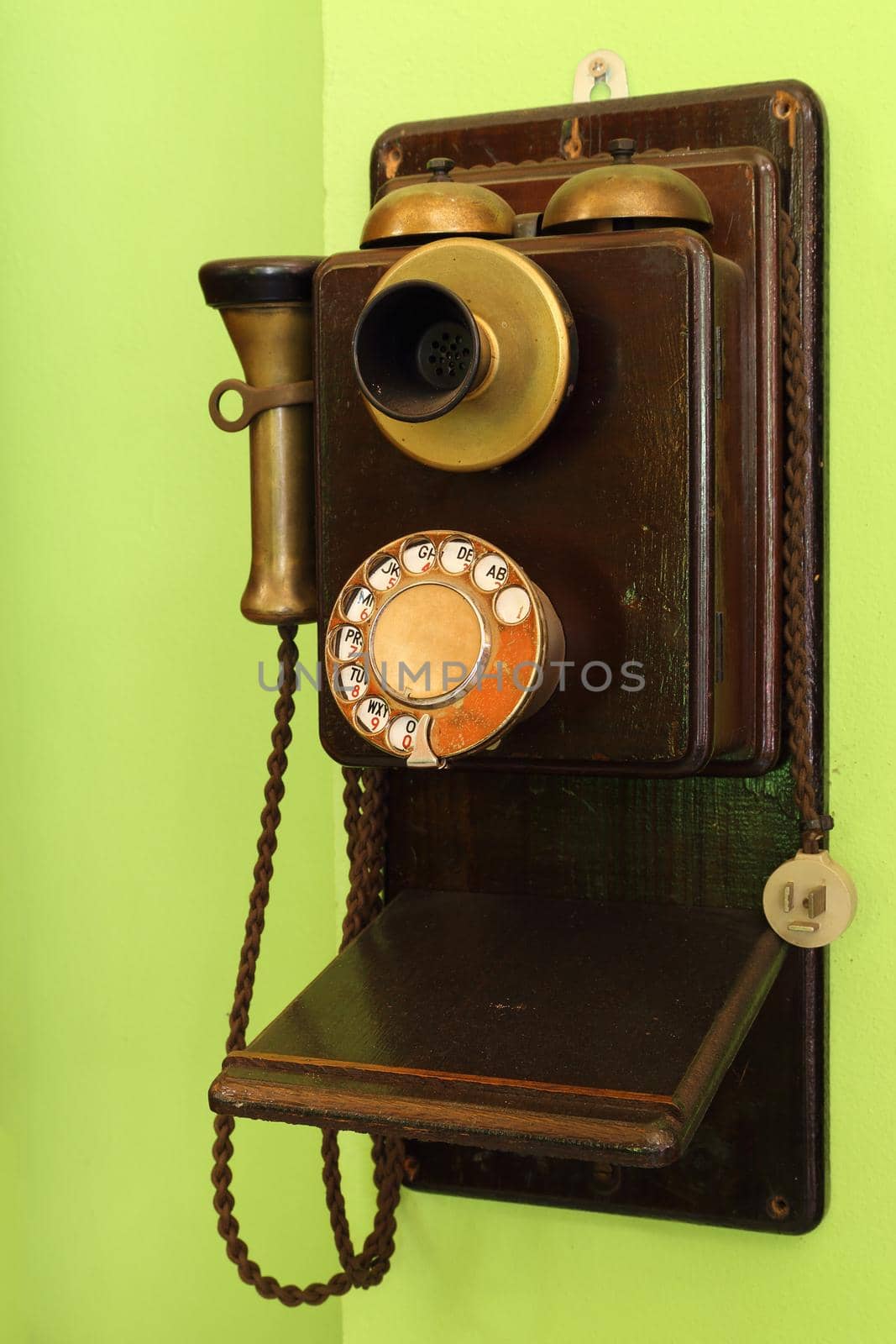classic wood telephone hanging by geargodz