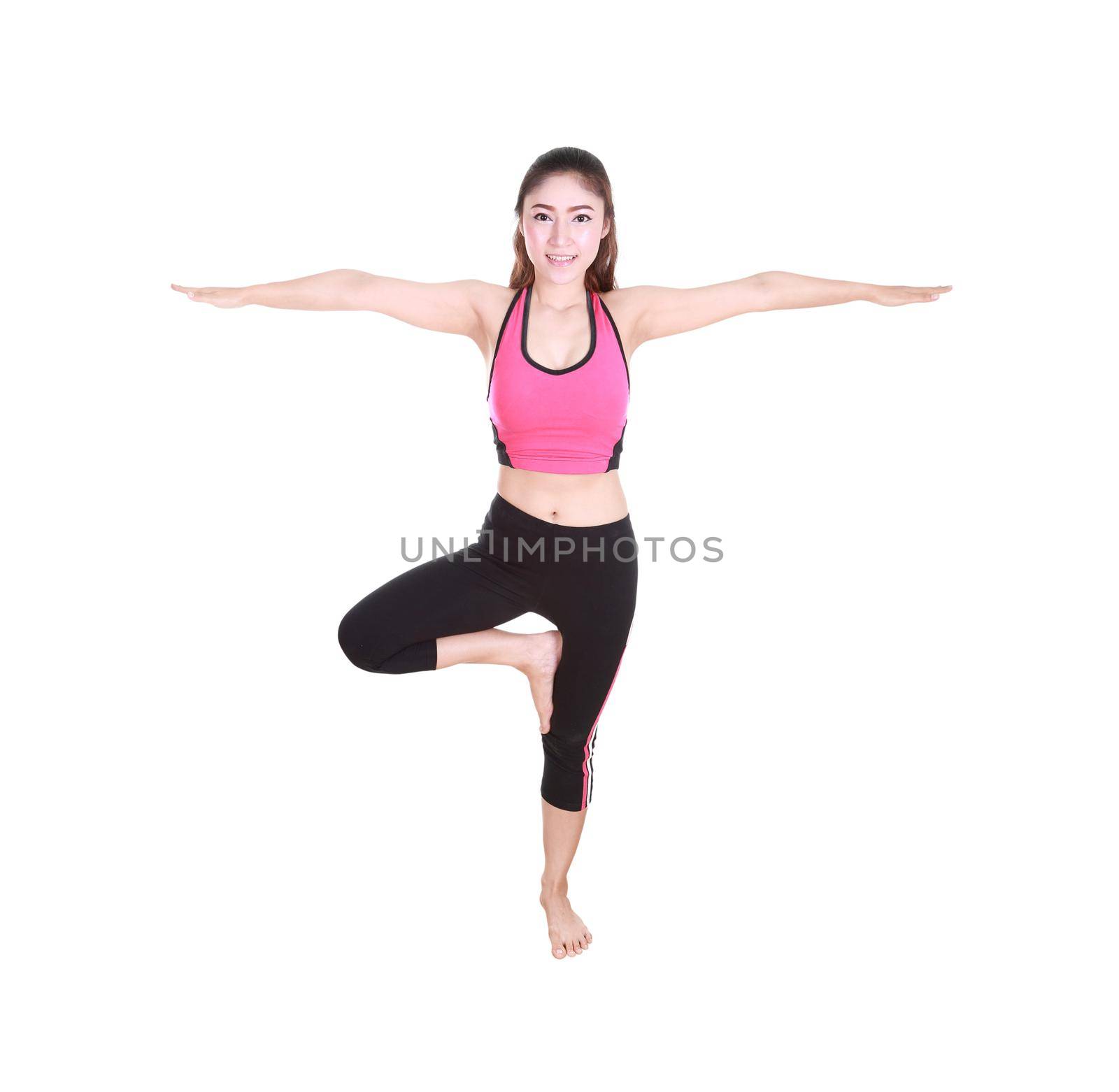 Young woman doing yoga exercise isolated on white background