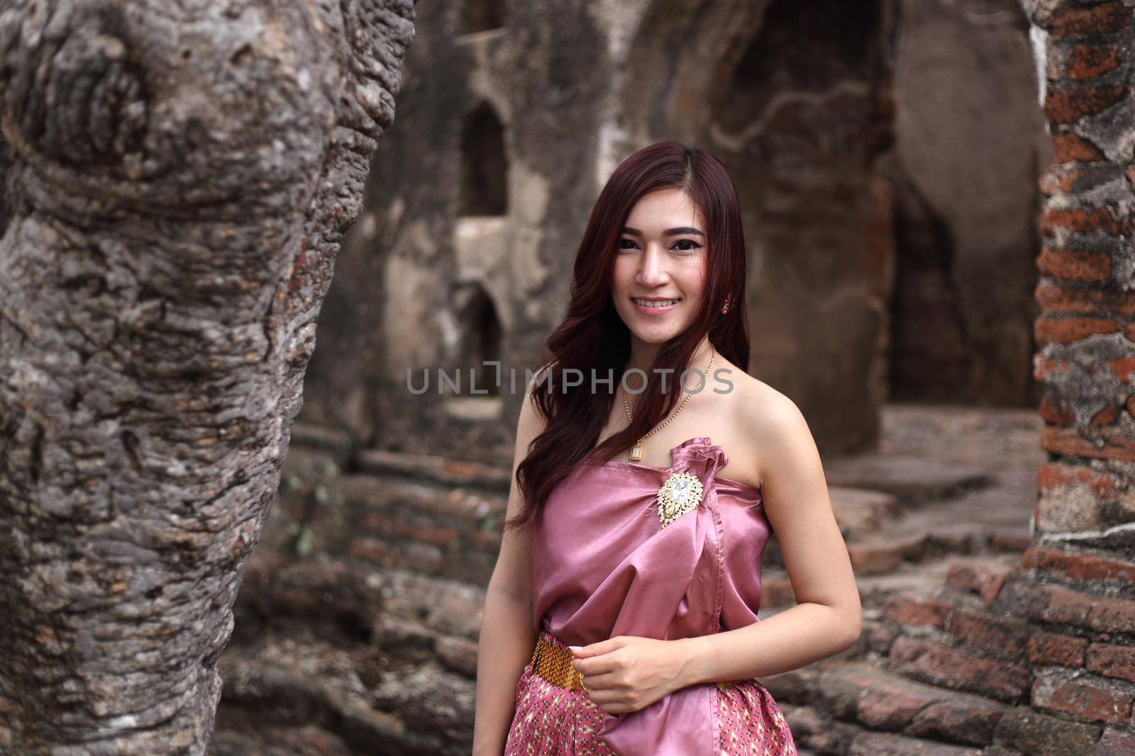 Female in Thai traditional dress at  historical park