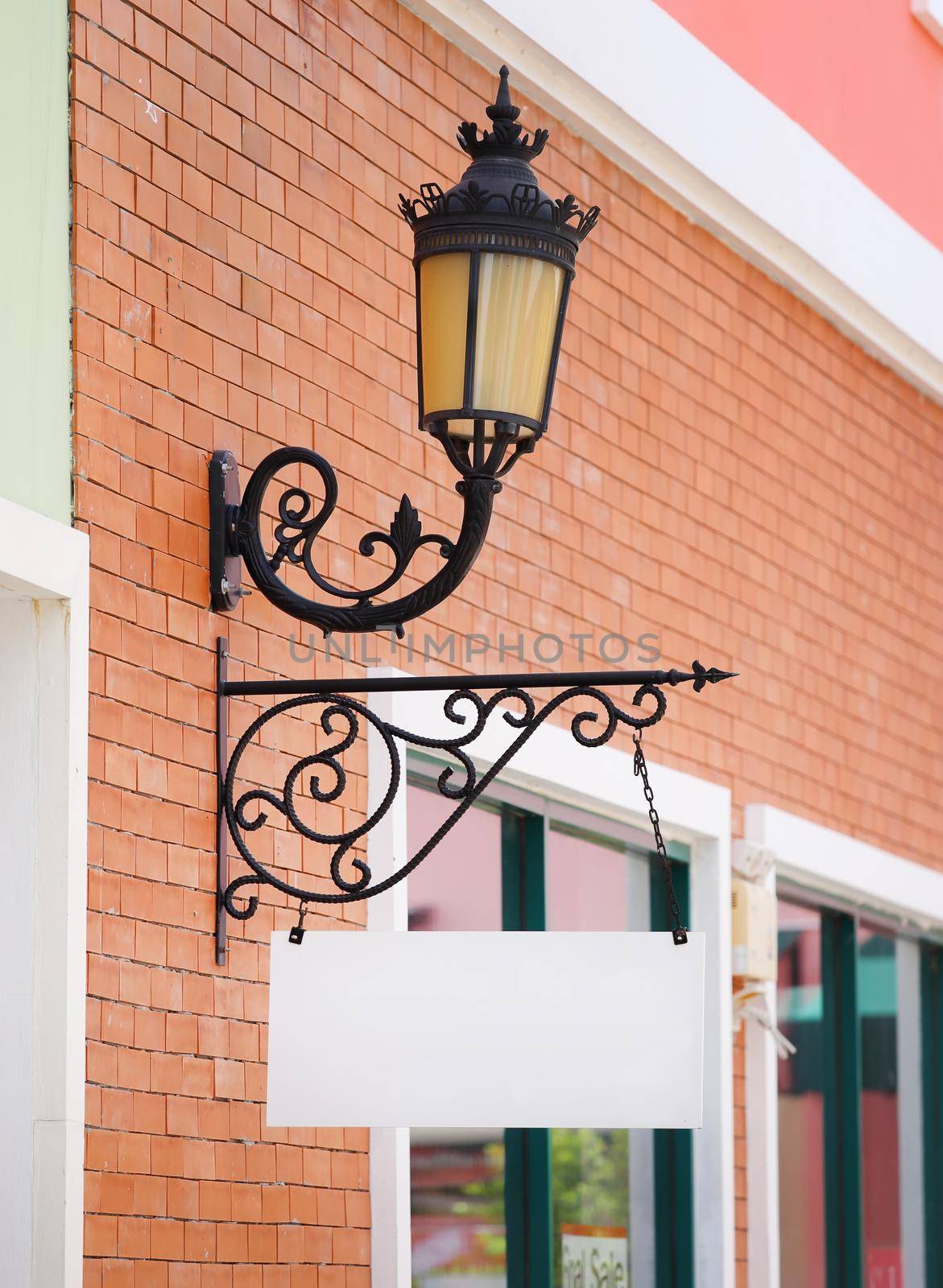 blank vintage sign on wall of traditional building