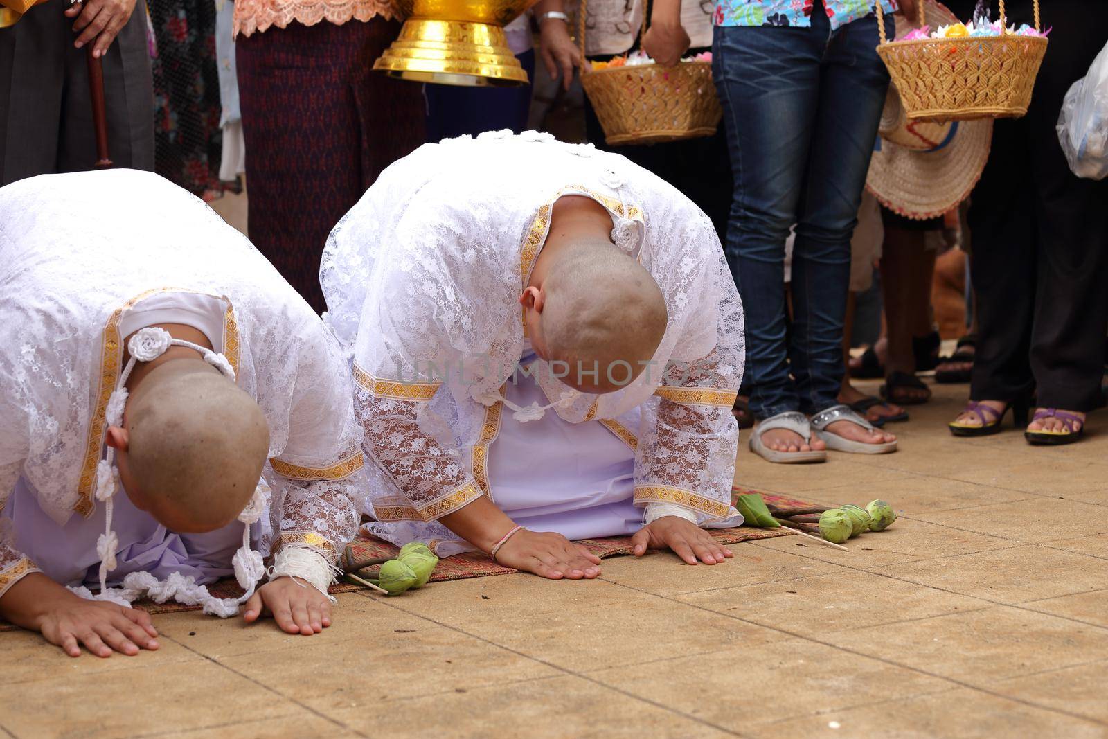 the ordination ceremony that change the Thai young men to be the new monks